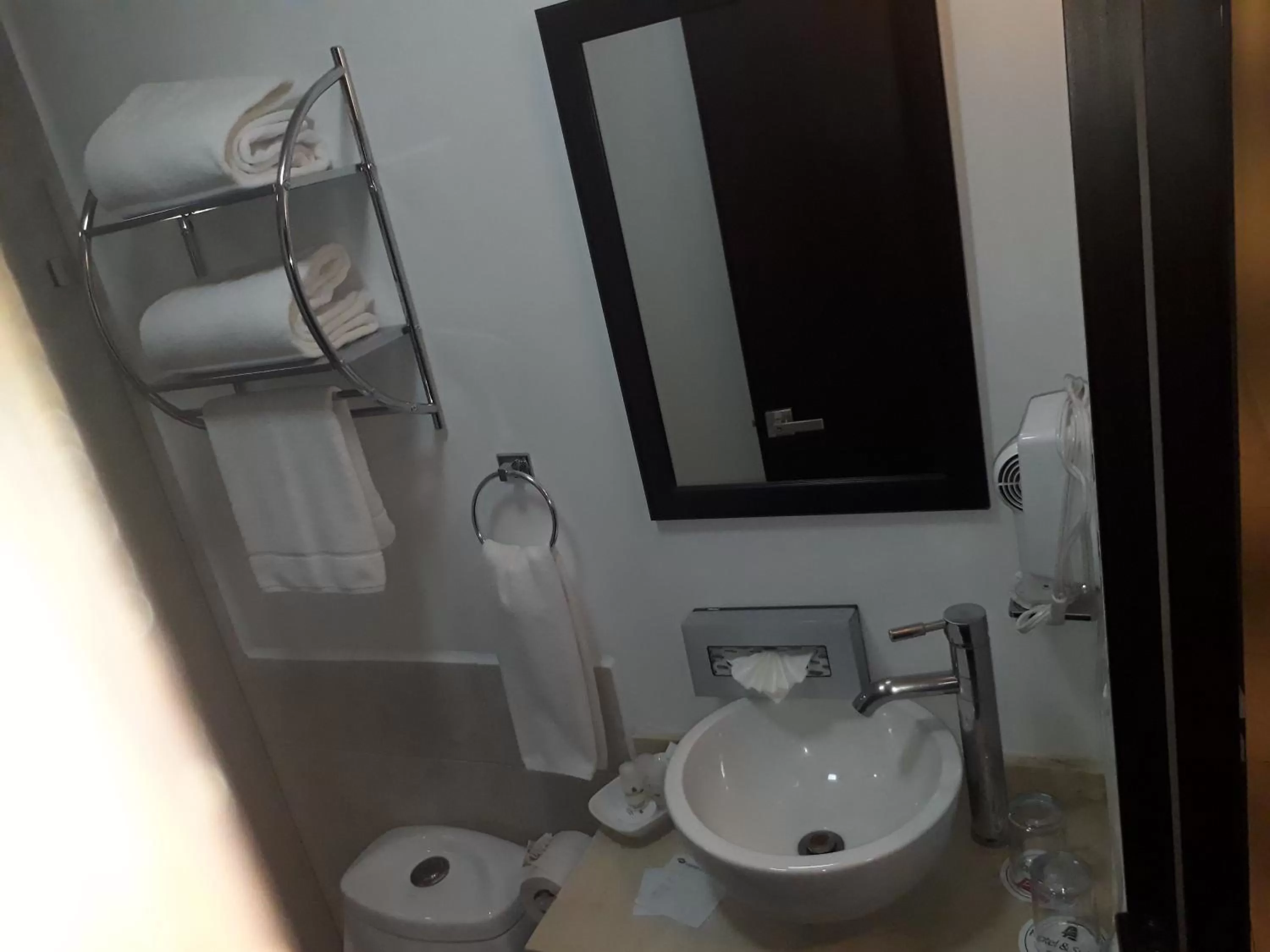 Bathroom in Hotel & Suites PF