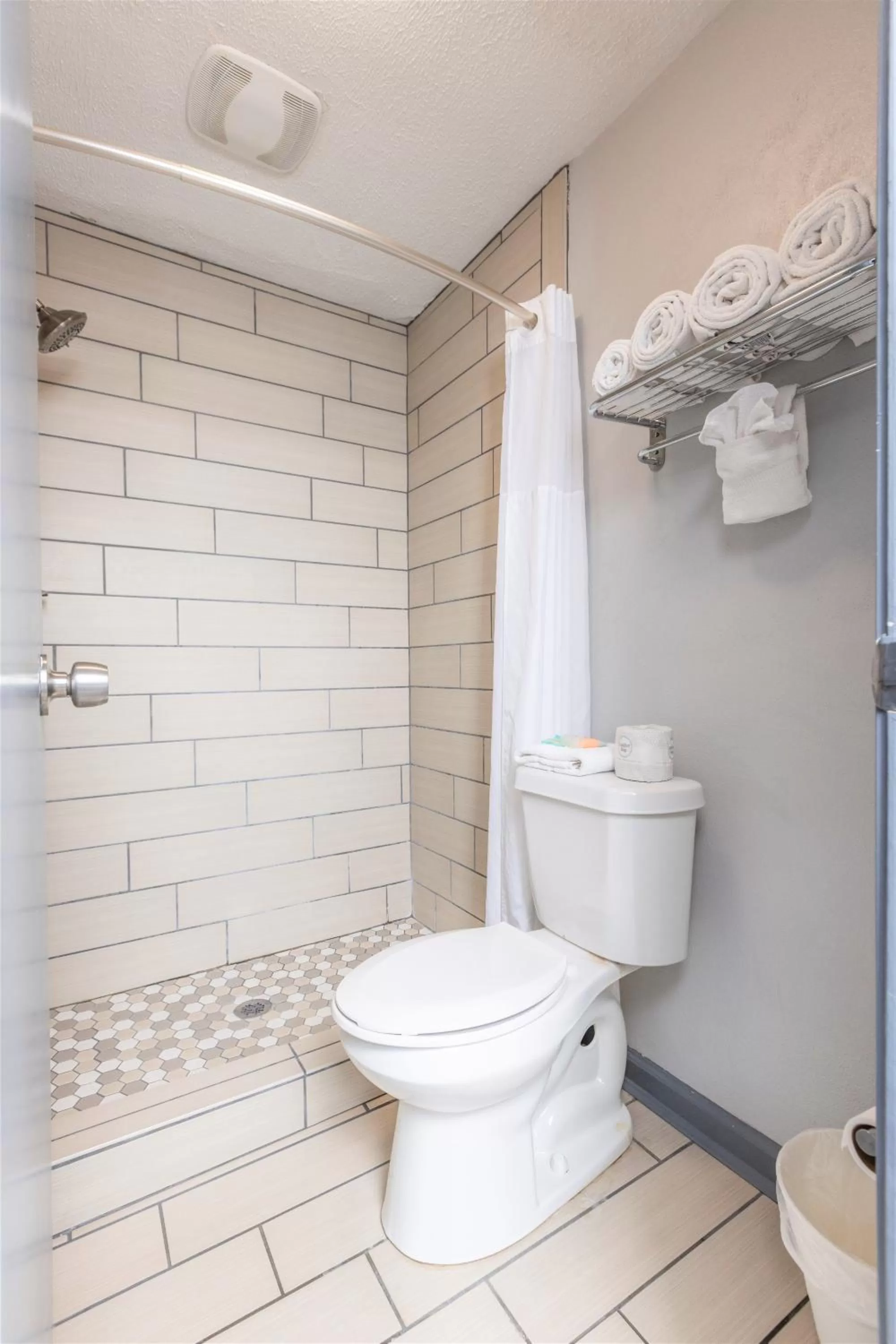 Toilet in Butler Inn