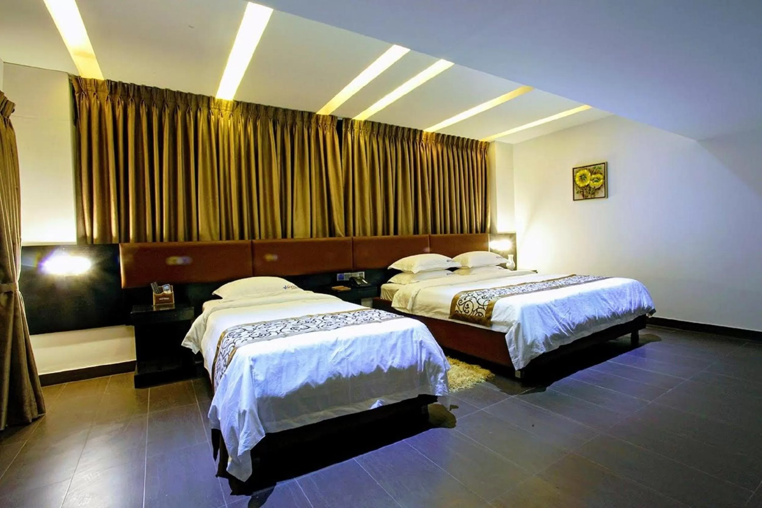 Photo of the whole room, Bed in D'more Dhaka Hotel & Resort