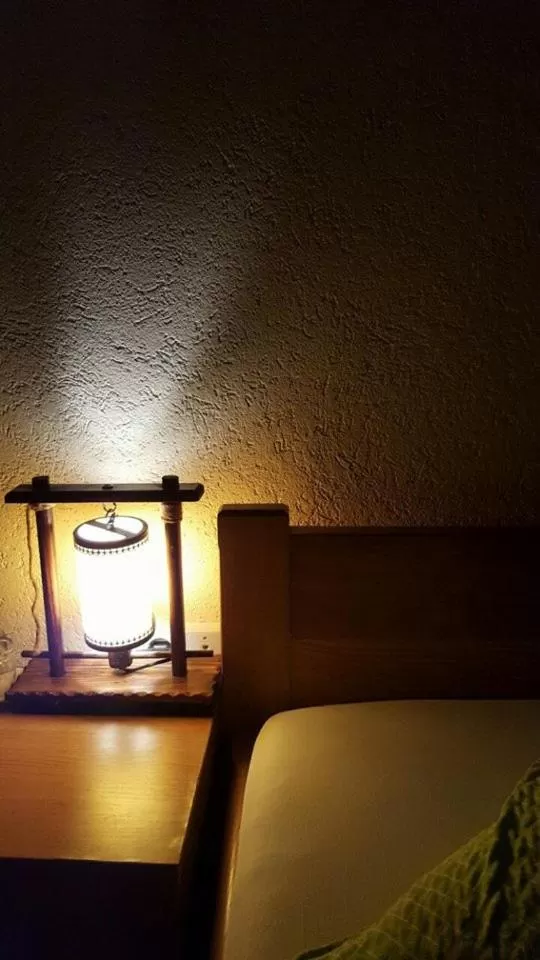 Bed in Motel Gas-Petrol