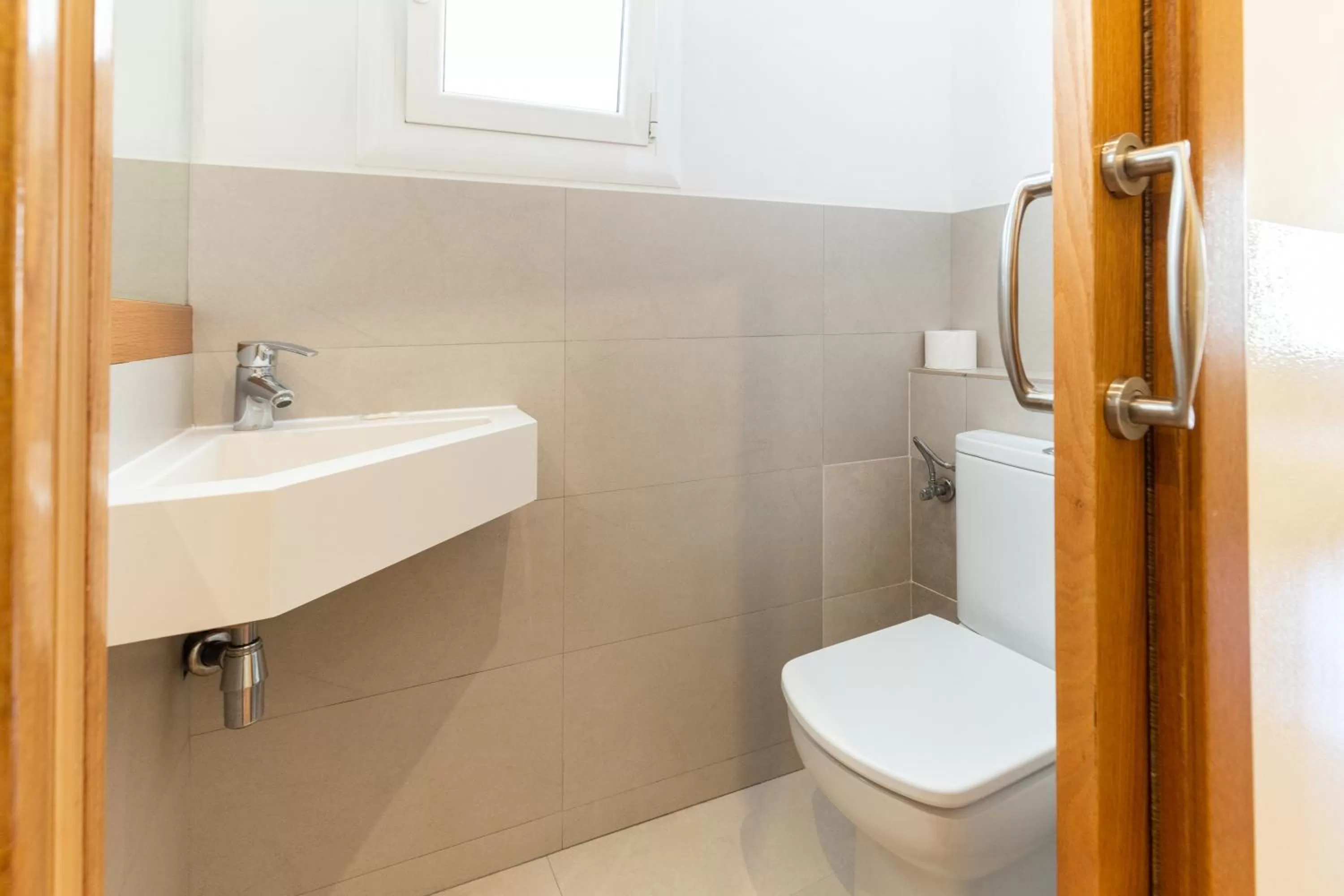 Toilet in Atica Apartments - by Weflating