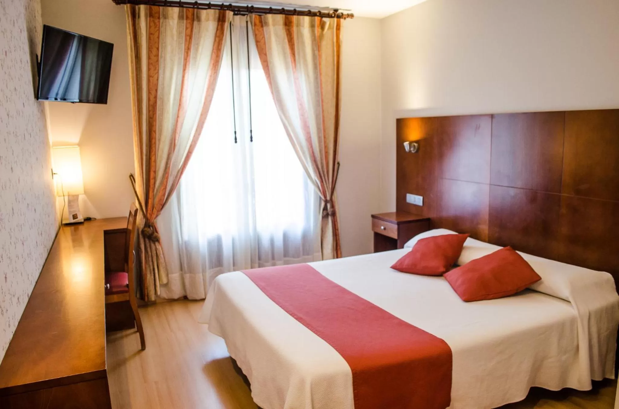 Bed in Hotel Jaqués