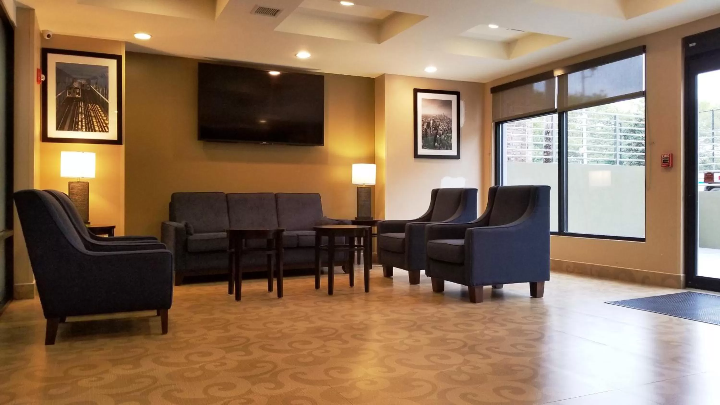 Seating area in Days Inn by Wyndham Brooklyn Marine Park