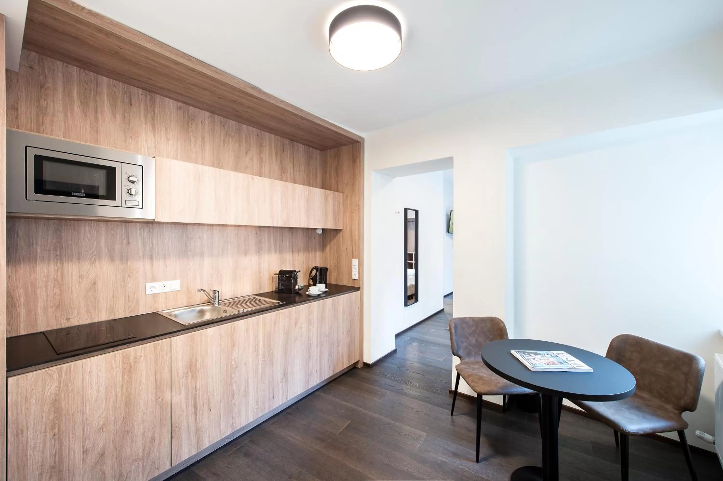Kitchen or kitchenette in Blackhome Innsbruck Boutique I contactless check-in