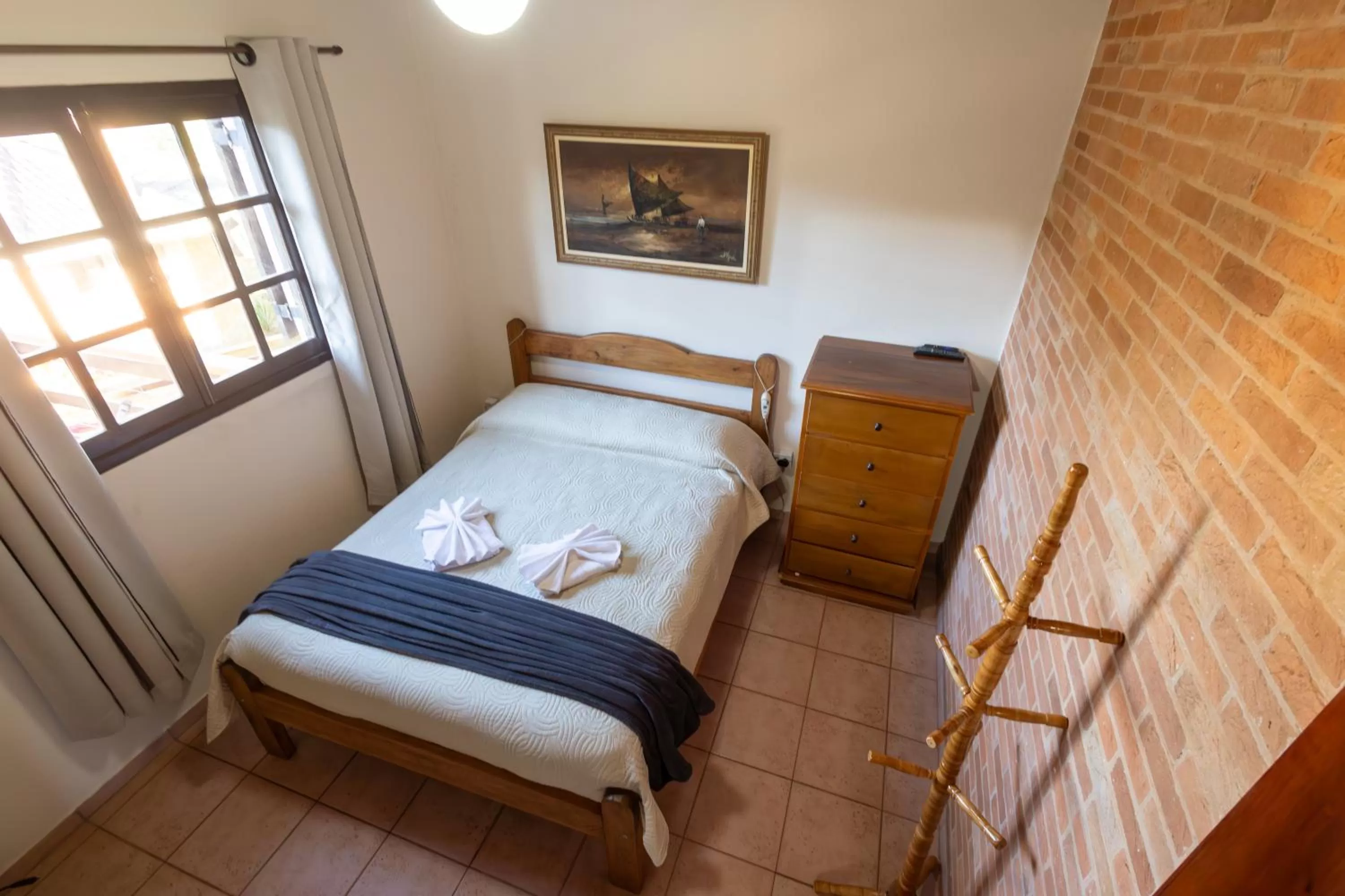 Bed in Pousada 3 Pinheiros