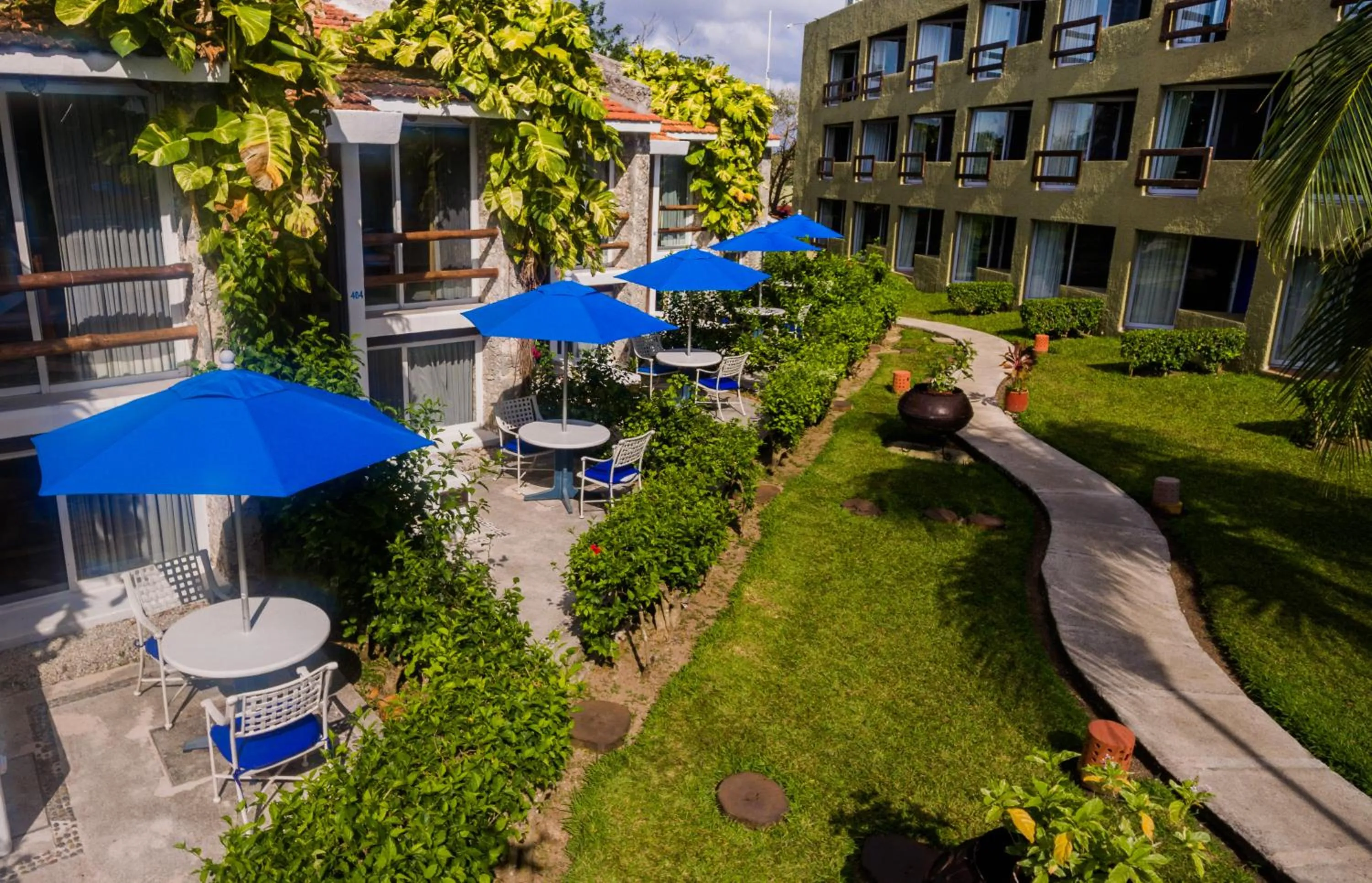 Patio in Casa del Mar Cozumel Hotel & Dive Resort with free access to an exclusive beach club