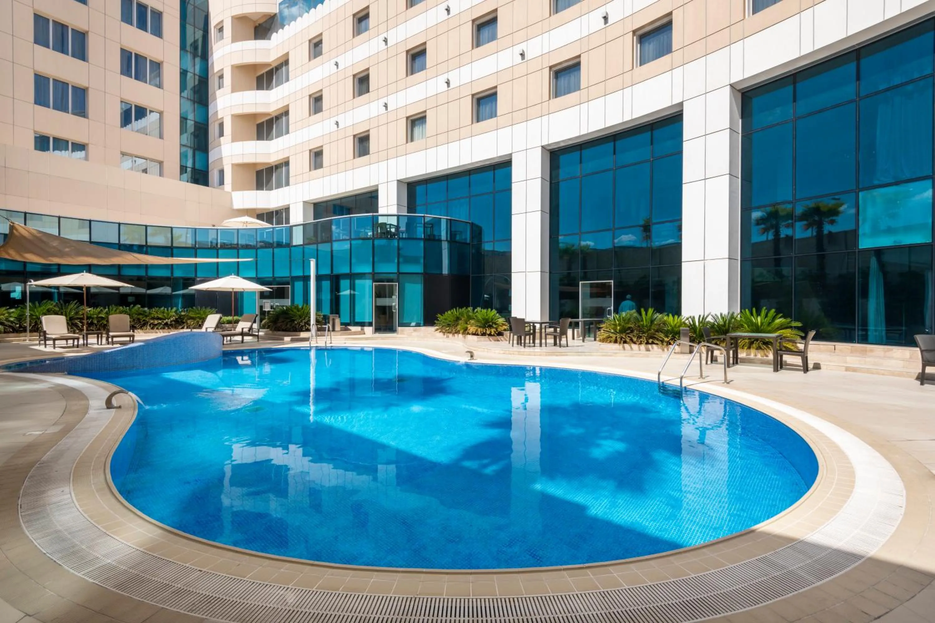 Swimming pool in Holiday Inn Muscat AlSeeb by IHG