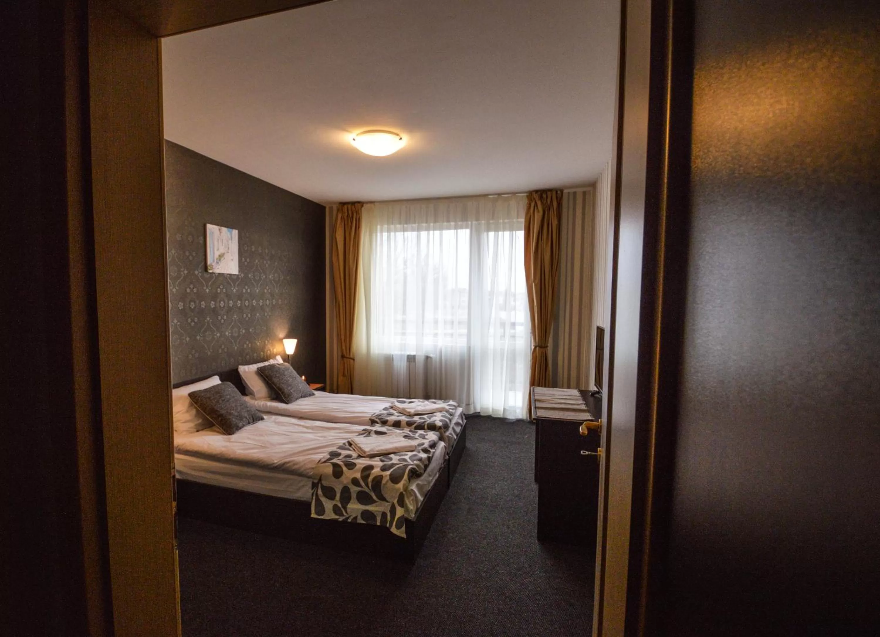 Bed in Elite Spetema Hotel