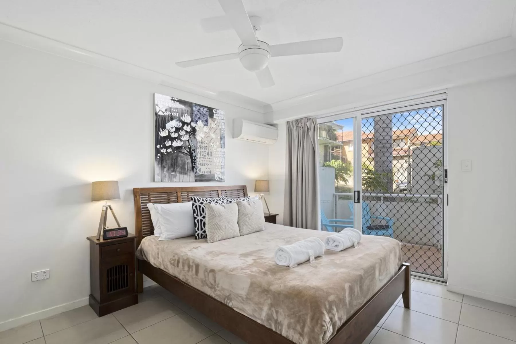 Bed in Kirra Palms Holiday Apartments