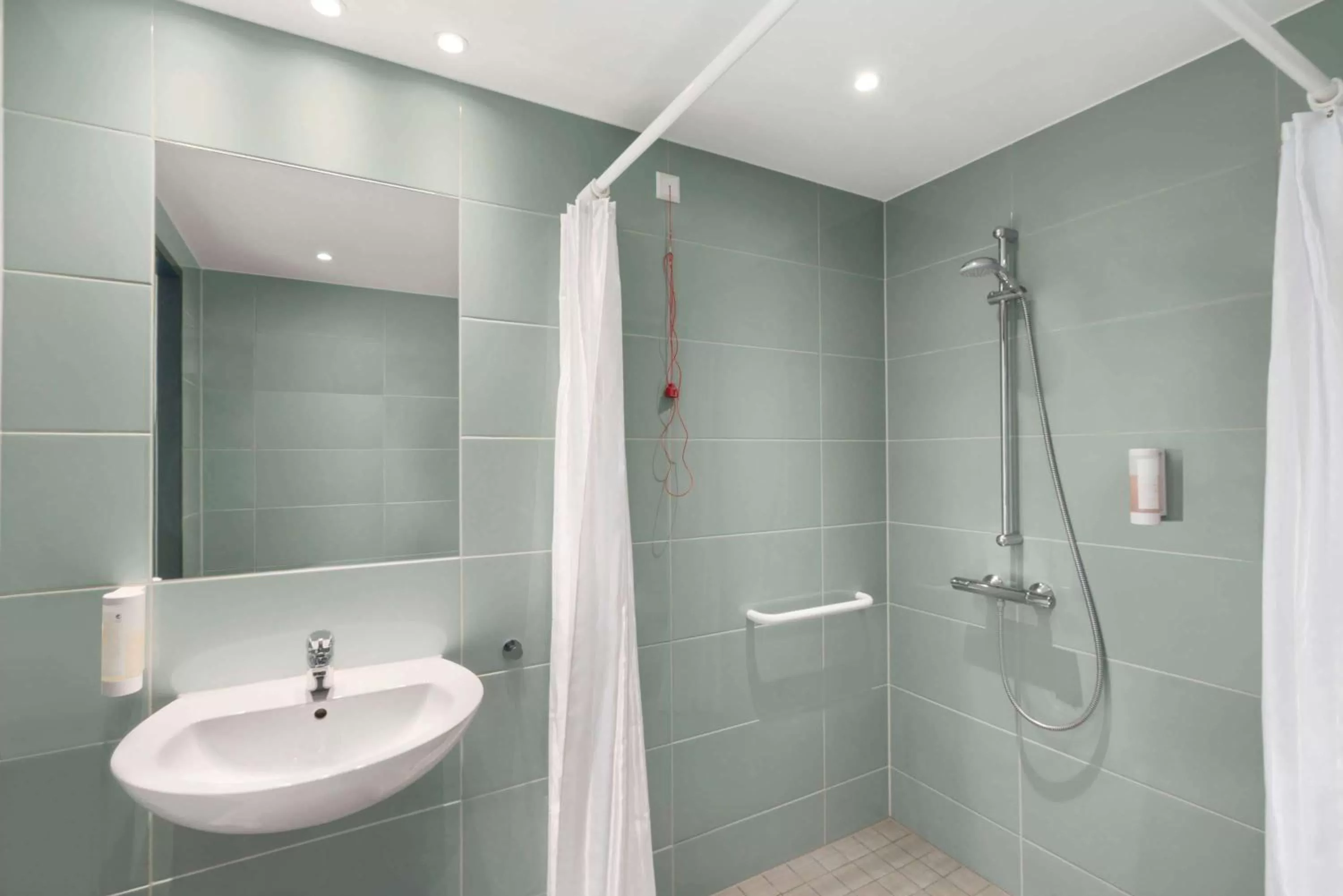 Bathroom in Super 8 by Wyndham Munich City West