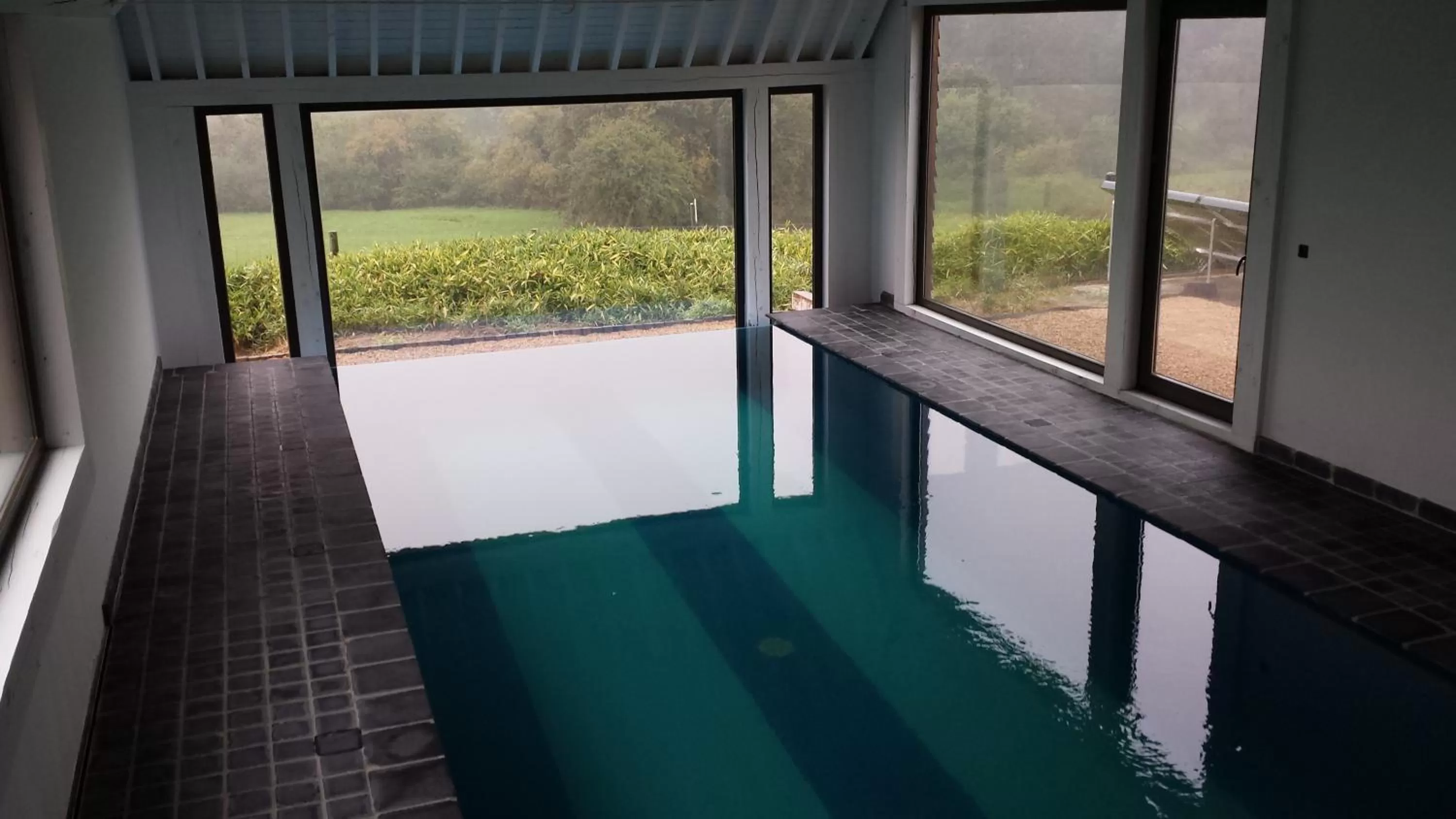 Pool view in B&B Le Briquemont