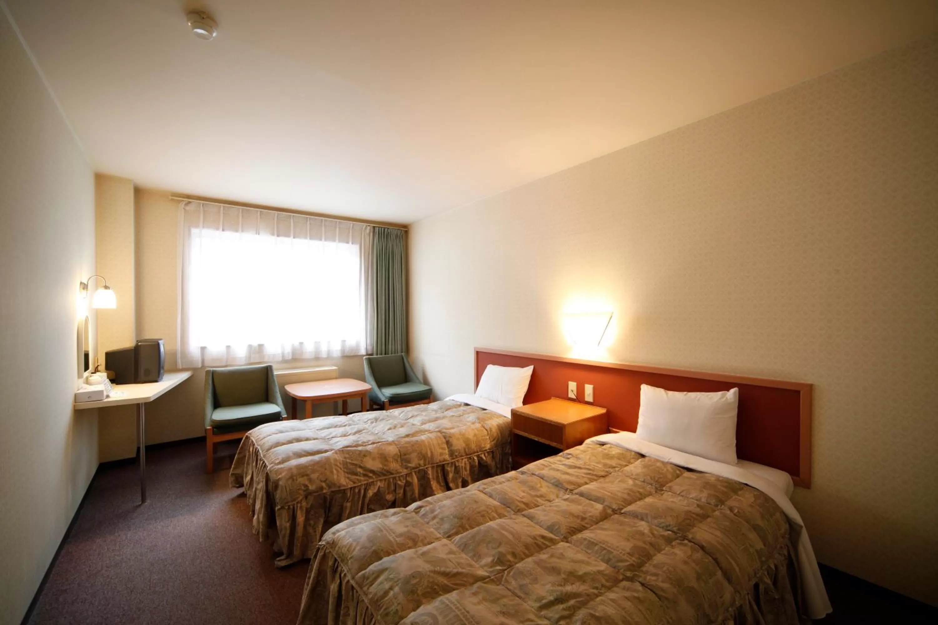 Bed in Hakuba Hotel Paipu no Kemuri