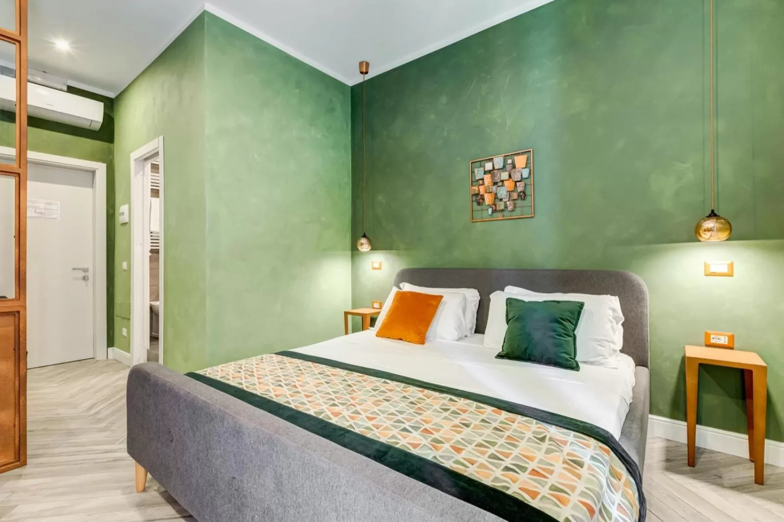 Bed in Ripetta Deluxe Suites