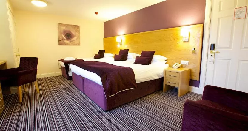 Bed in Ayre Hotel & Ayre Apartments