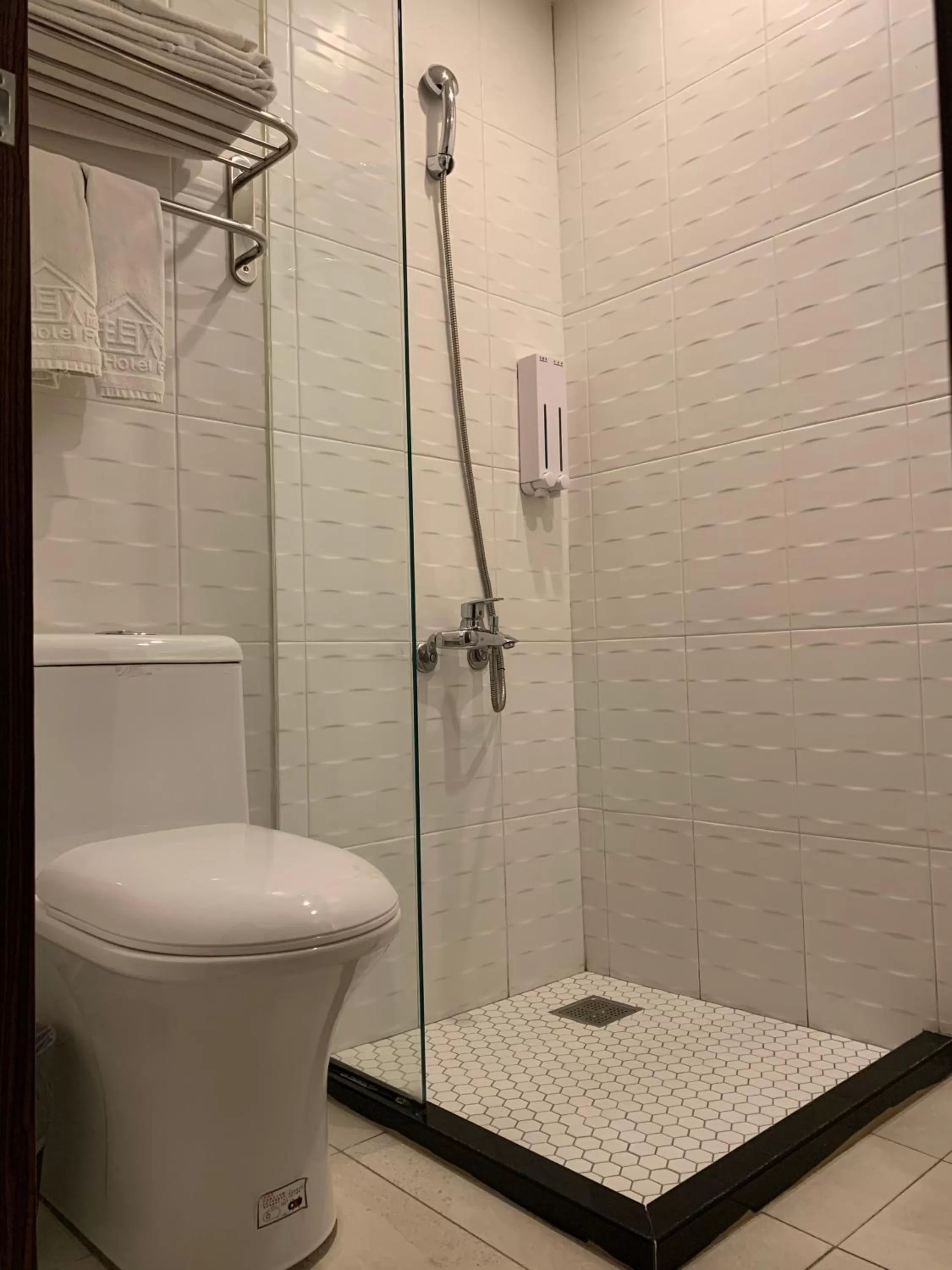 Toilet in Skyone Hotel