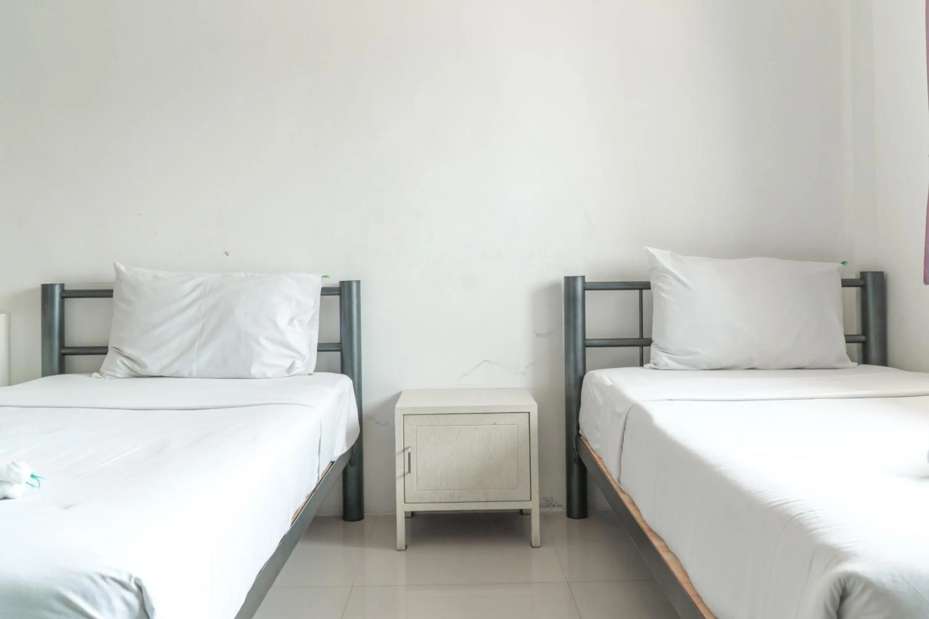 Bed in Noble House Chiangmai