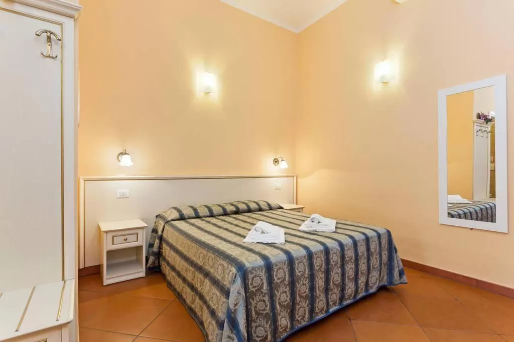 Photo of the whole room, Bed in Vatican Town