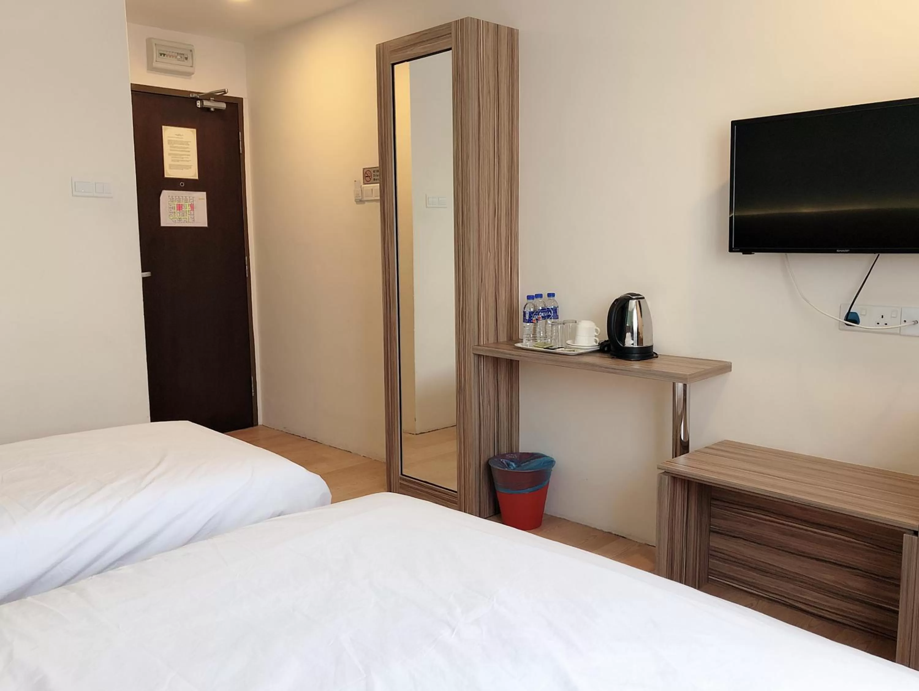 Bed in Tumike Hotel Bentong