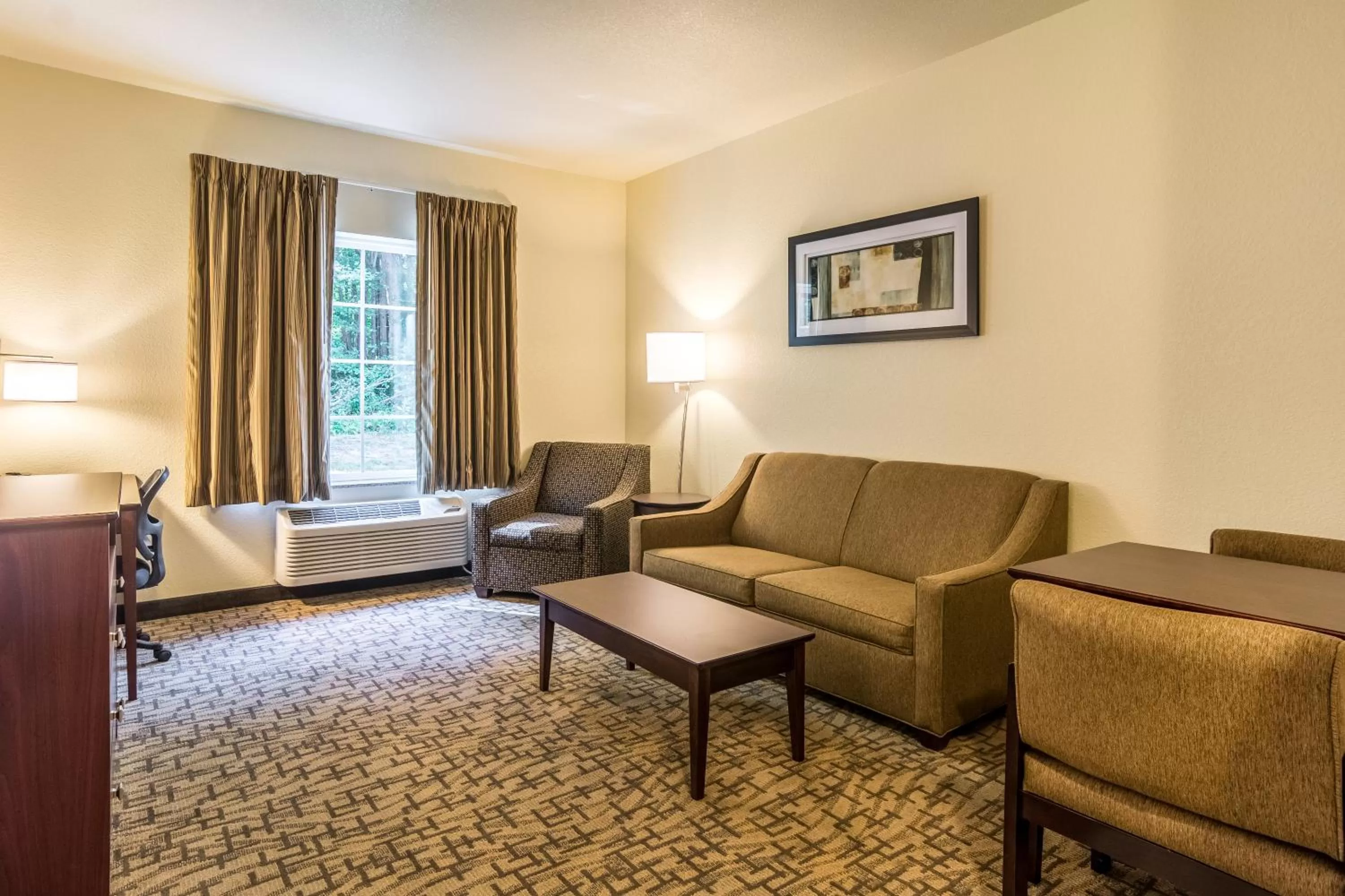 Bed in Cobblestone Hotel & Suites - Torrington