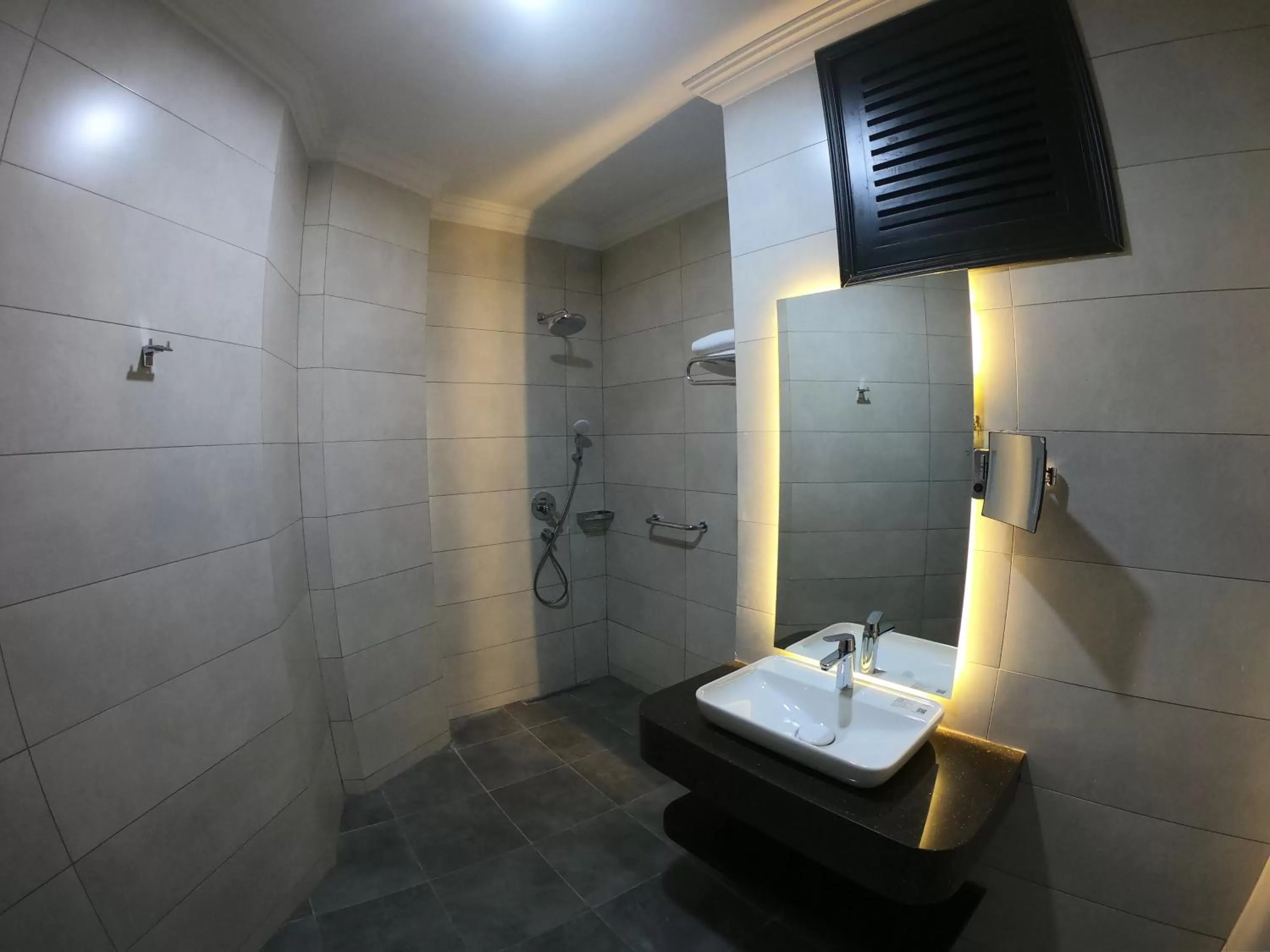 Bathroom in Horizon Manor Hotel