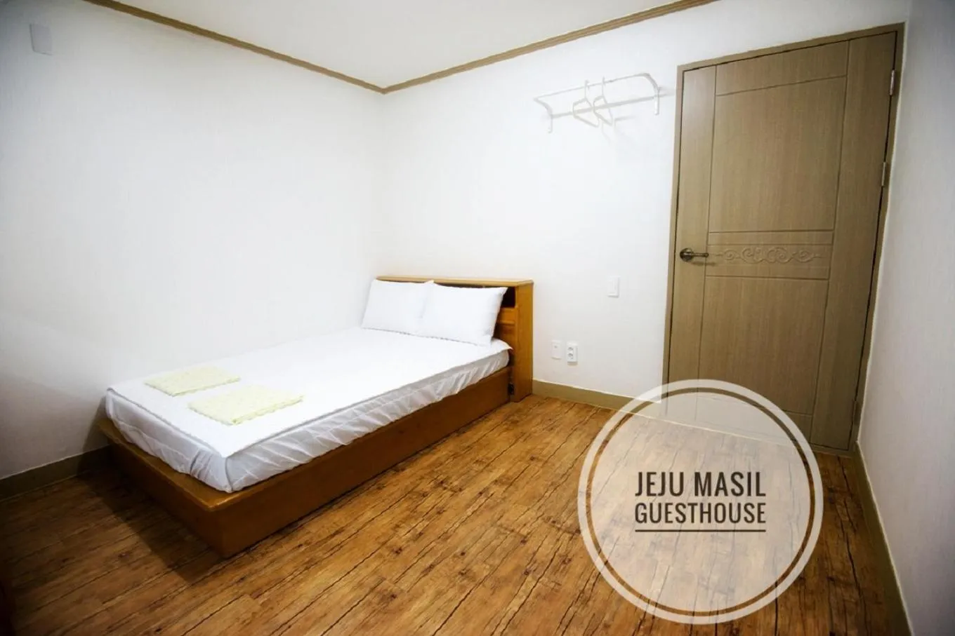 Bed in Jeju Masil Guesthouse