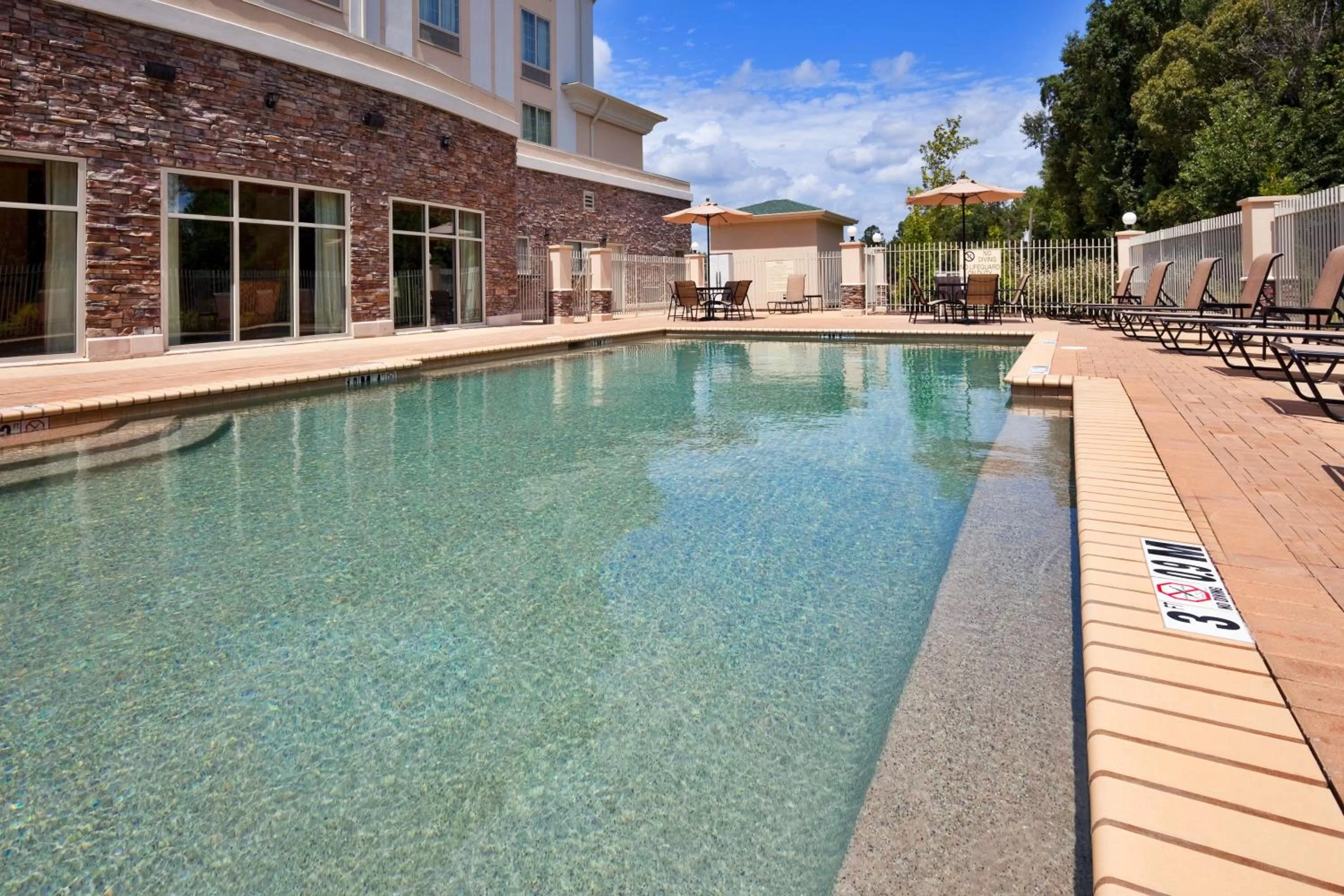 Swimming pool in Holiday Inn Express Phenix City-Fort Benning by IHG