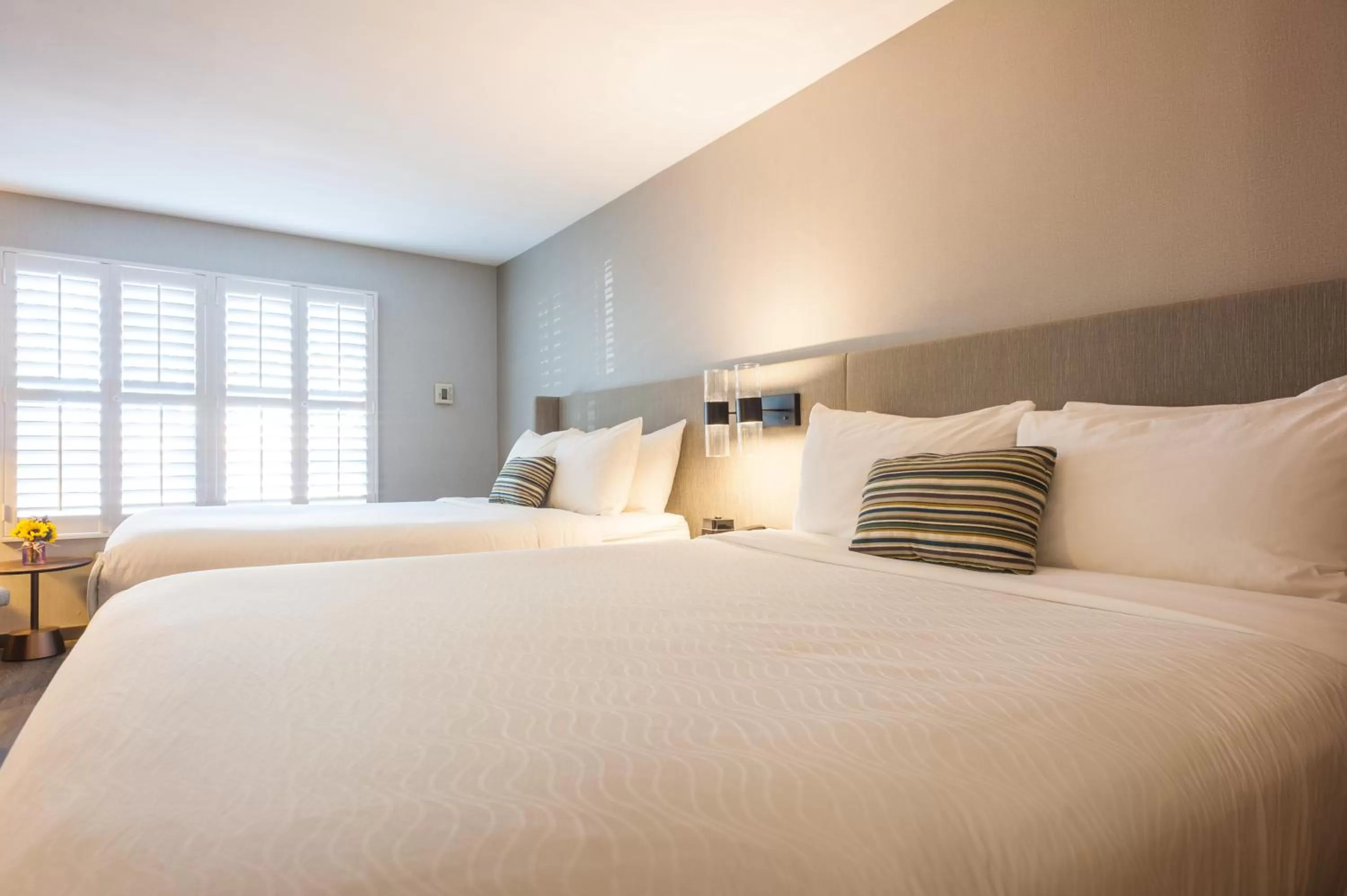 Bed in Hotel Indigo Napa Valley by IHG