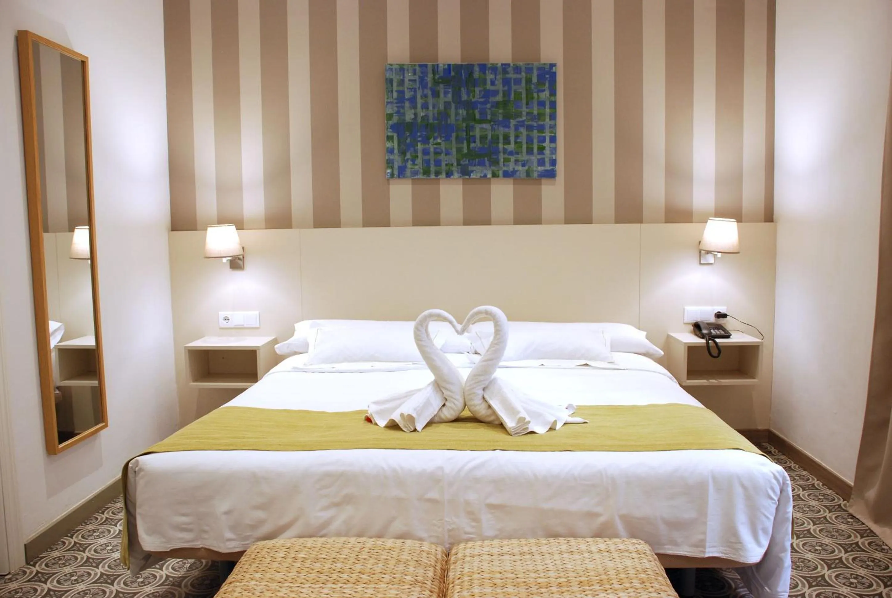 Bed in Hotel San Lorenzo Boutique Plaza