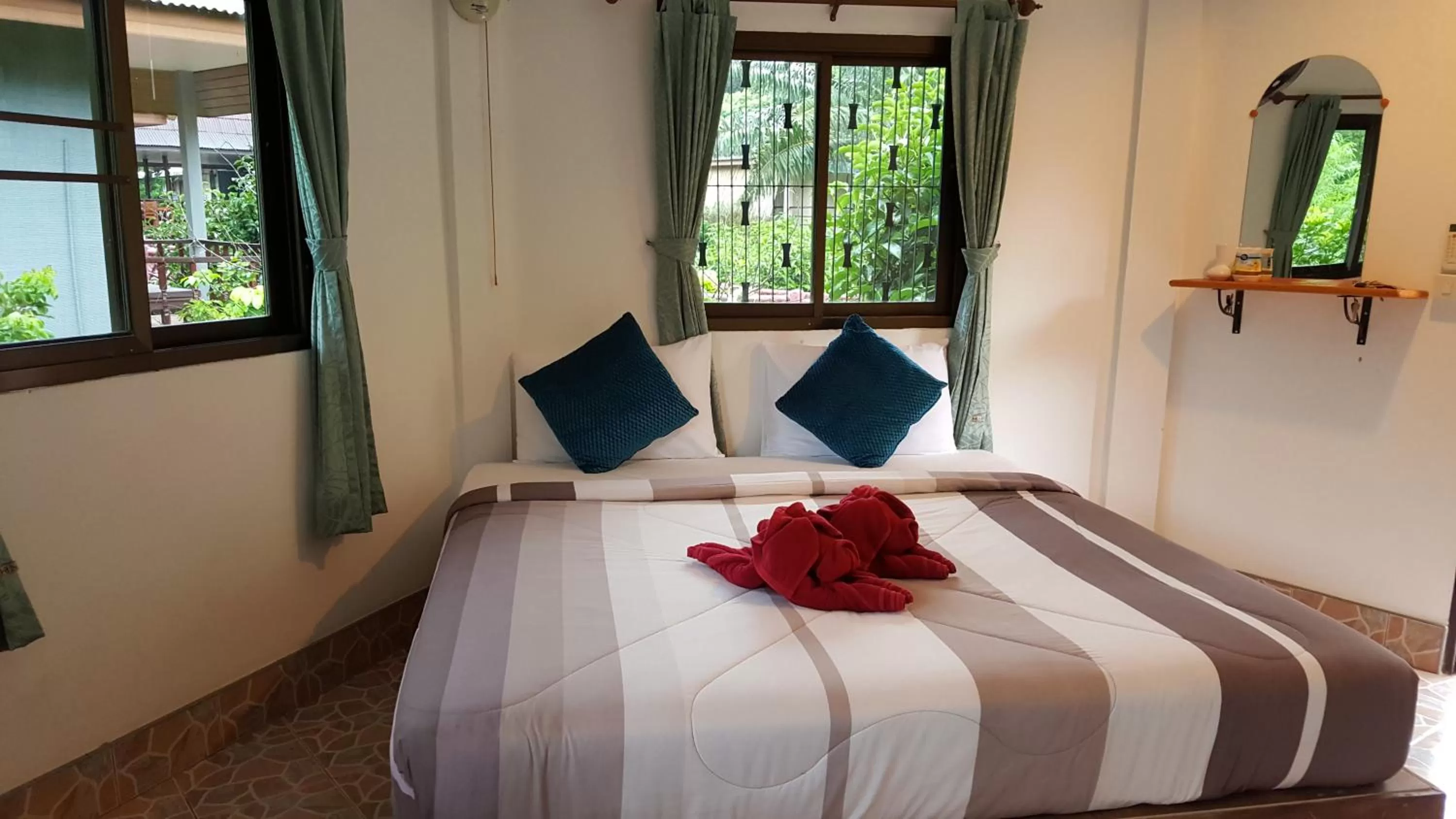 Bed in Khao Sok Jungle Huts Resort