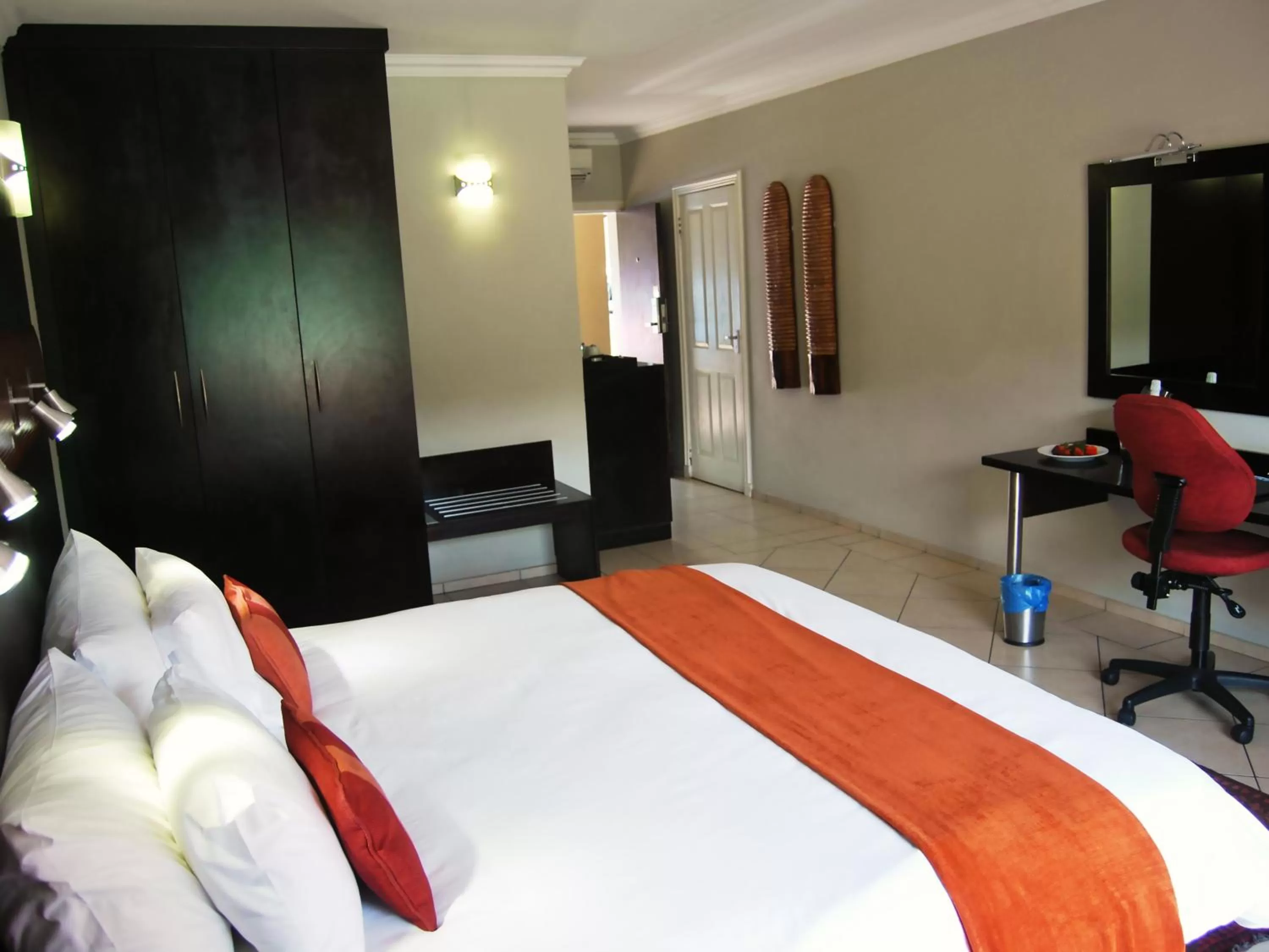 Bed in Safari Hotel & Convention Centre