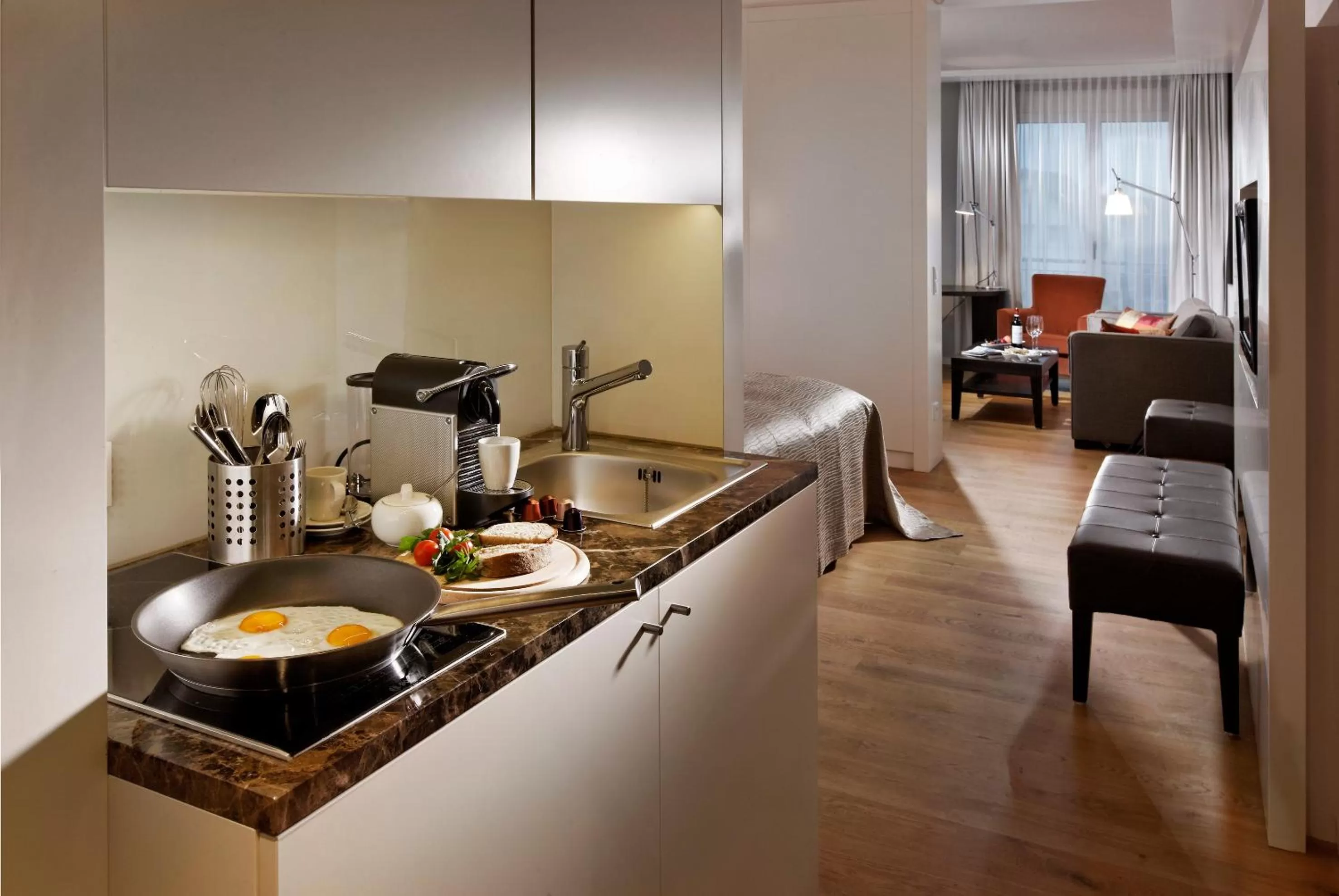 Kitchen or kitchenette in Parkhotel Stuttgart Messe-Airport