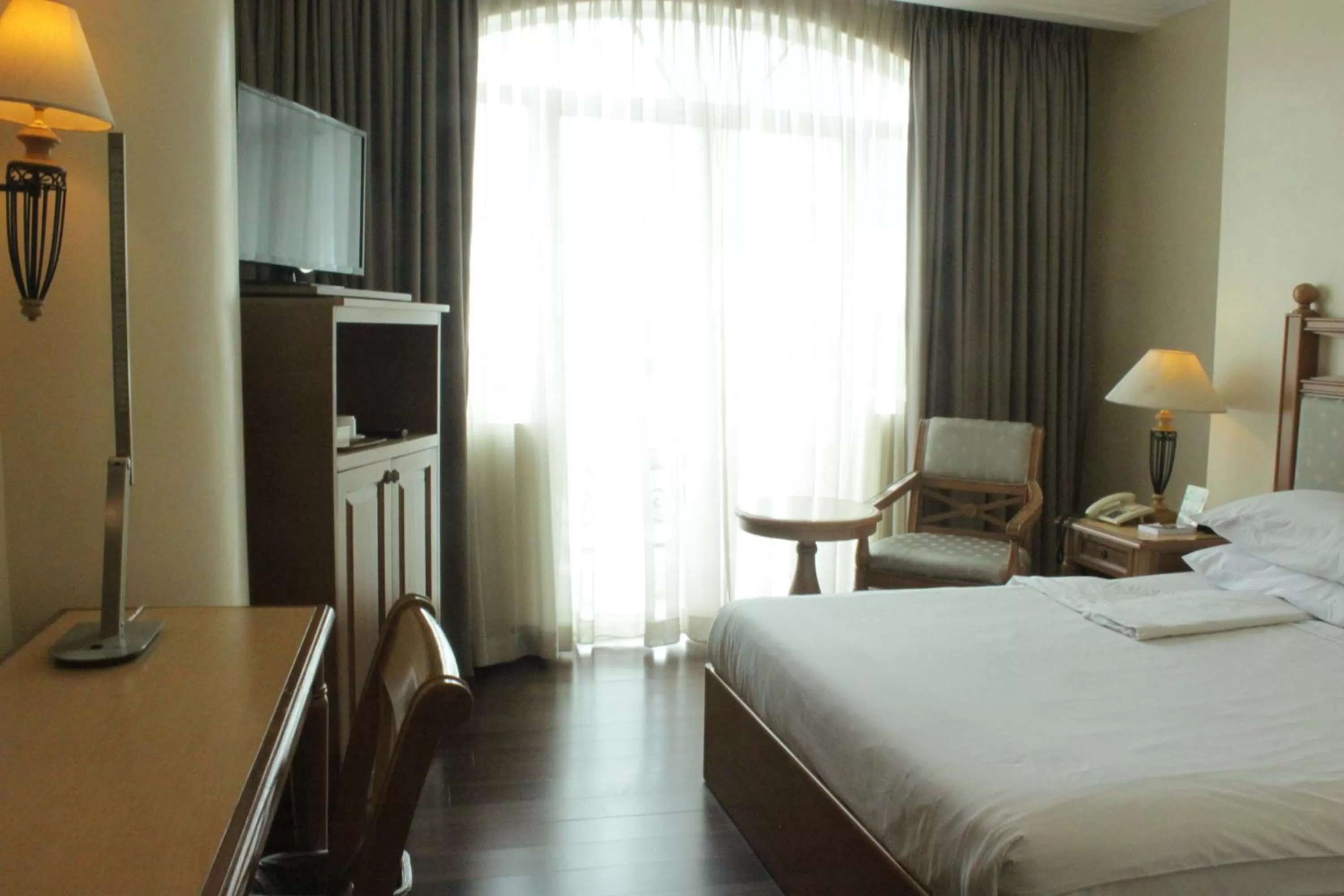 Bed in The Grand Dame Hotel