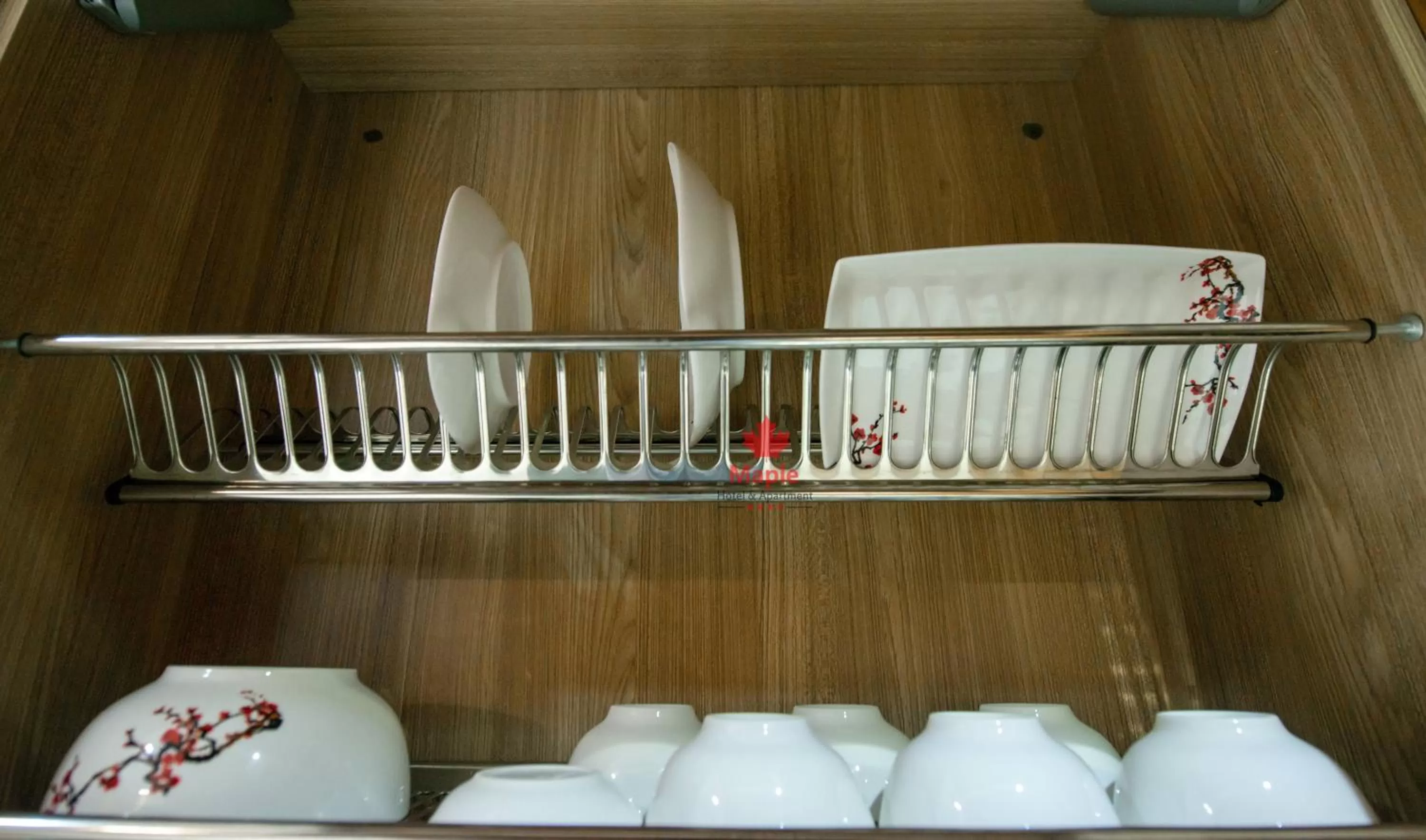 Kitchen or kitchenette in Maple Hotel & Apartment