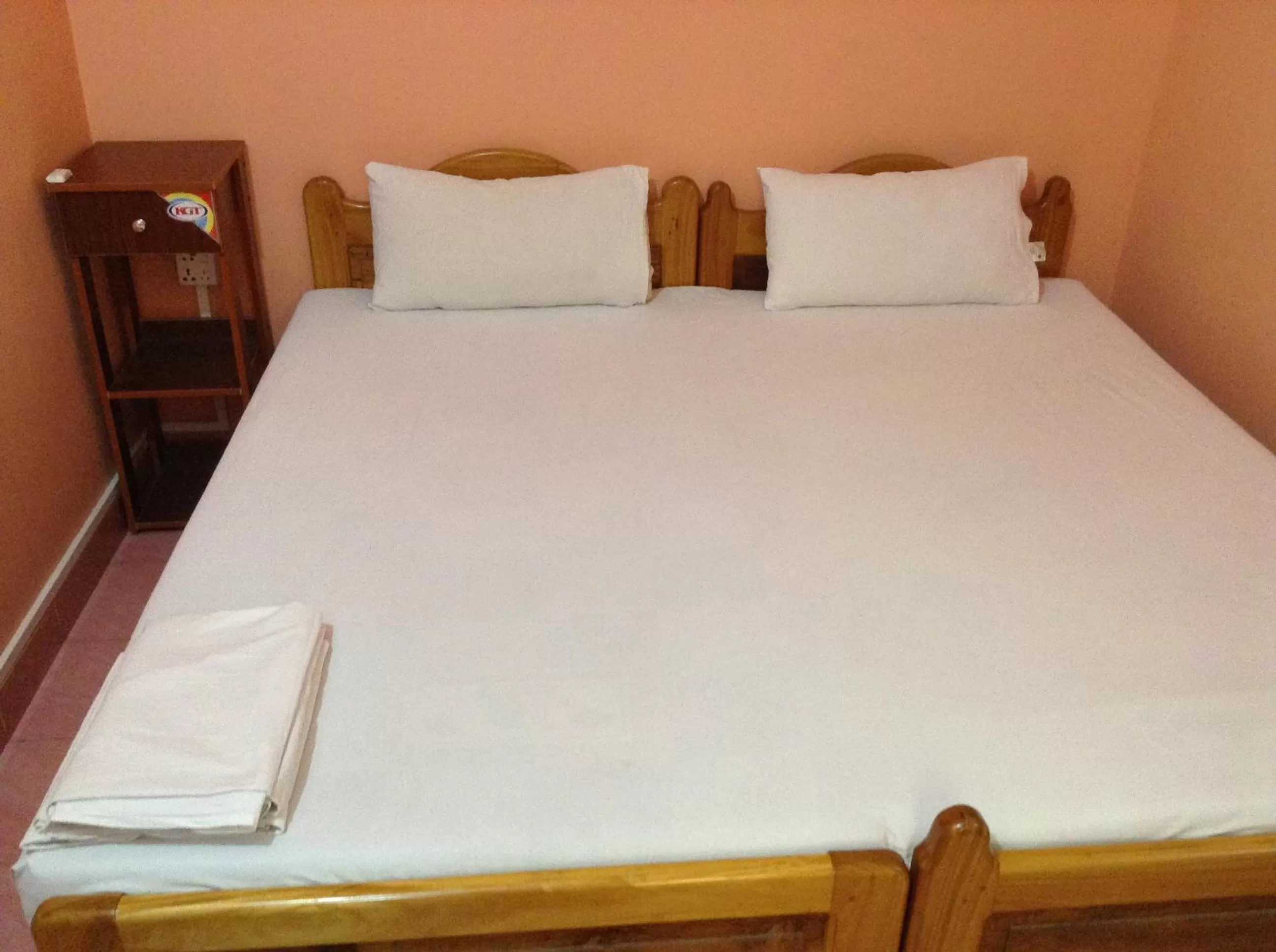 Bed in Sunshine Hotel