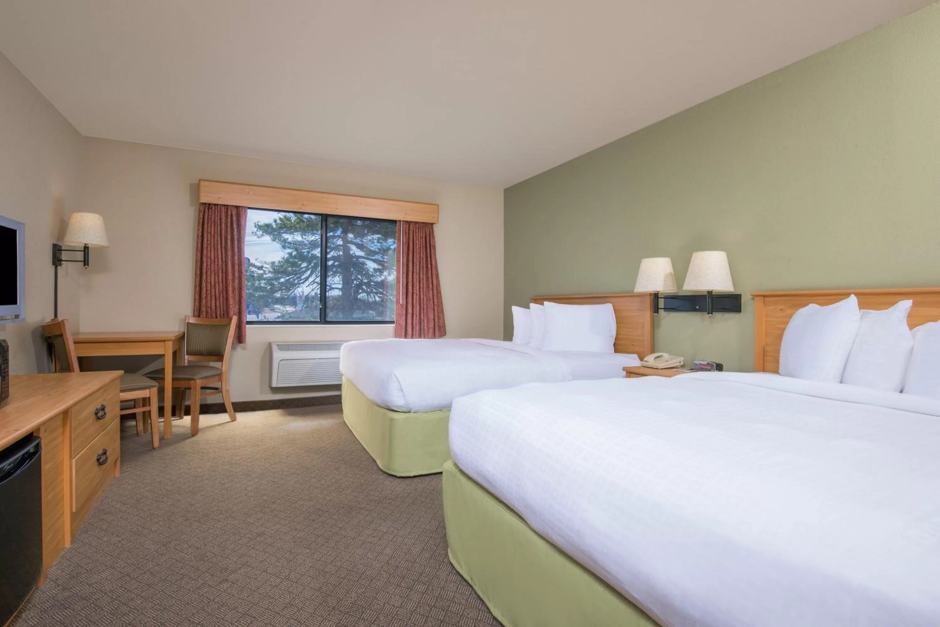 Photo of the whole room, Bed in AmericInn by Wyndham Pampa Event Center