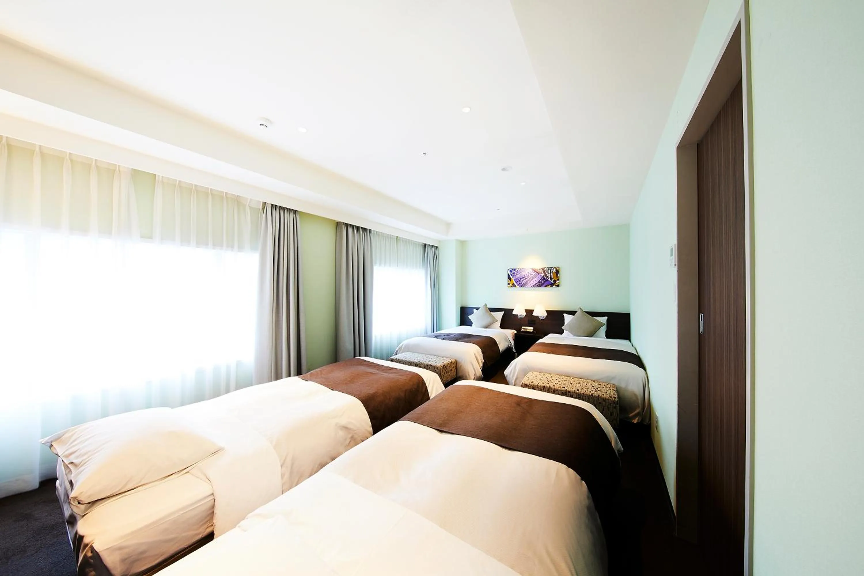 Bed in Ginza Grand Hotel