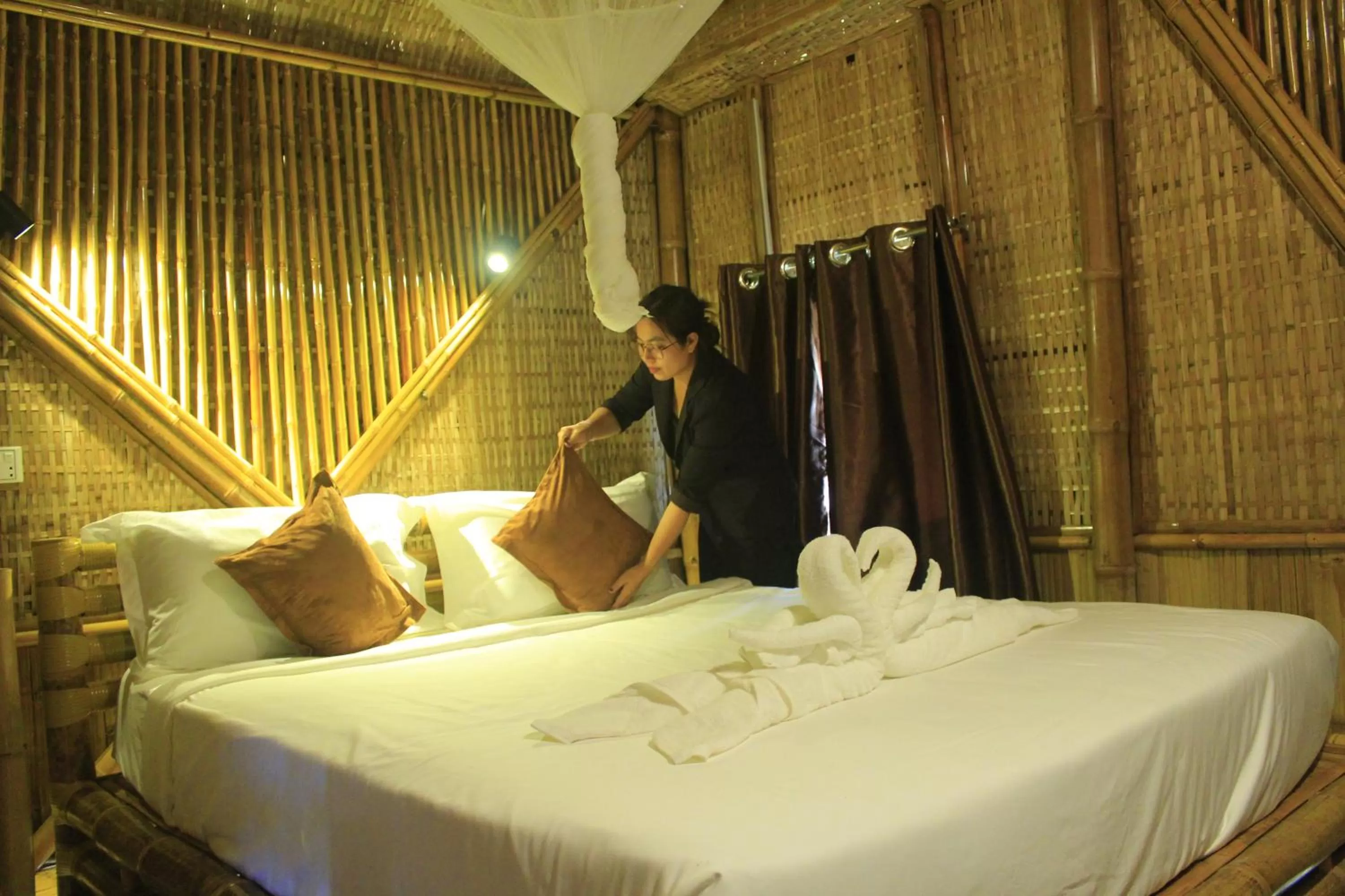 Bed in Hanchey Bamboo Resort
