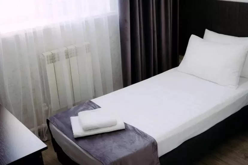 Bed in Rush Hotel