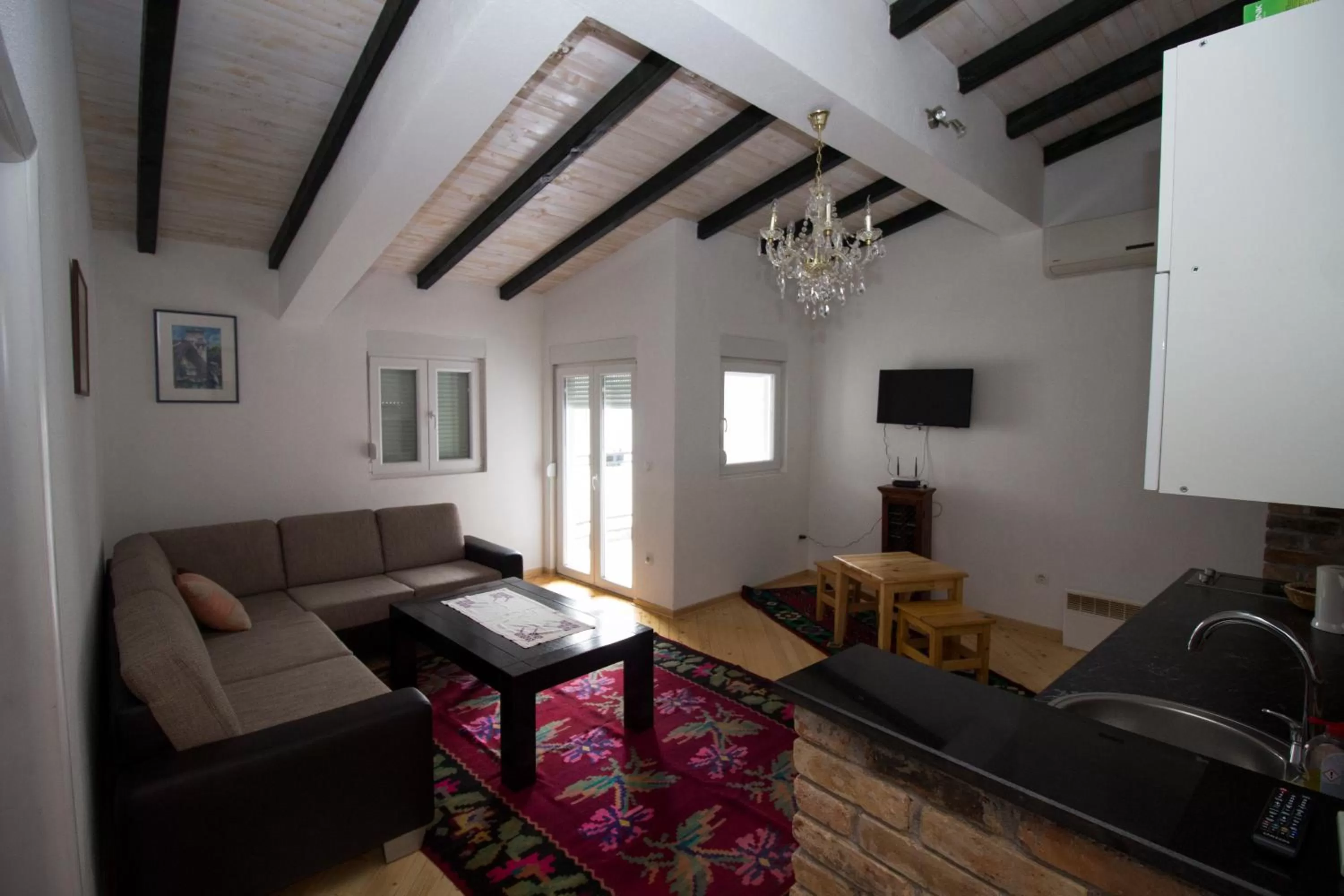 TV and multimedia, Seating Area in Hotel & Rooms Lombrelle