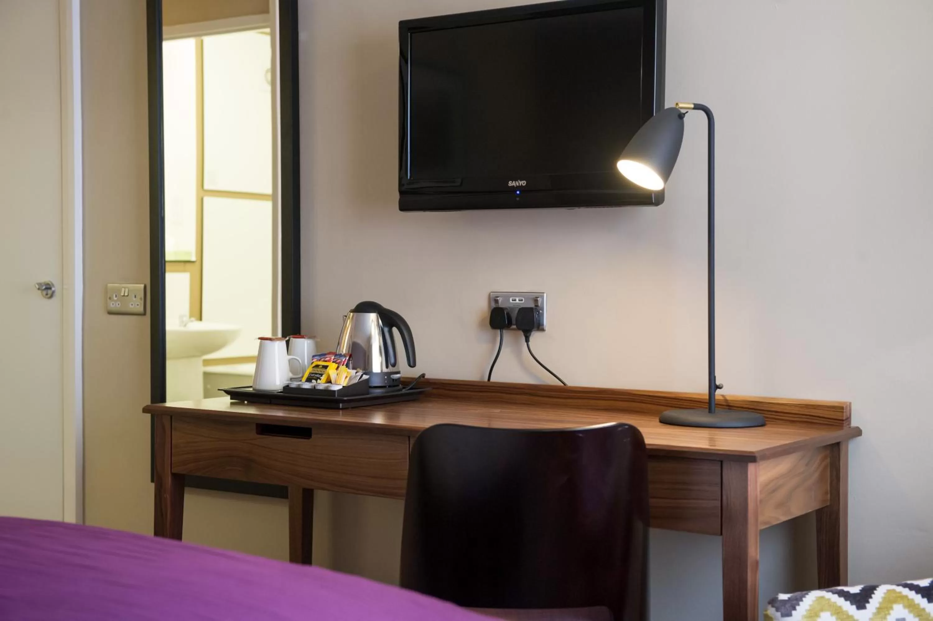 Decorative detail, TV/Entertainment Center in The Crown & Greyhound by Innkeeper's Collection