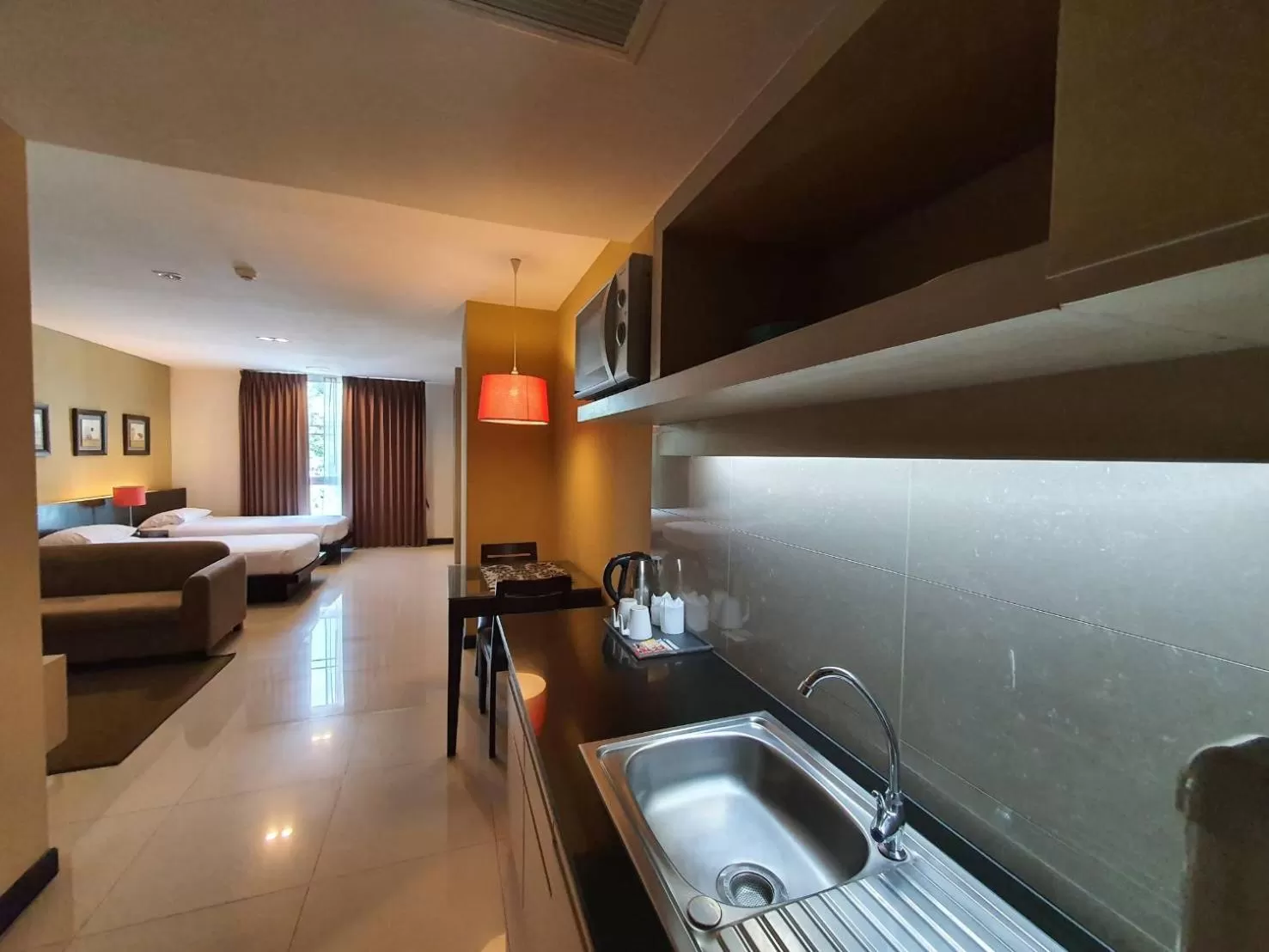 Photo of the whole room, Bed in The Grand Wipanan Residence