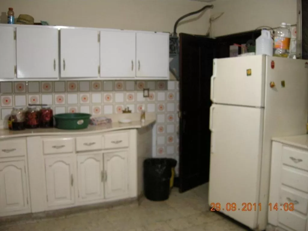 Communal kitchen in Tamarindo Hostel