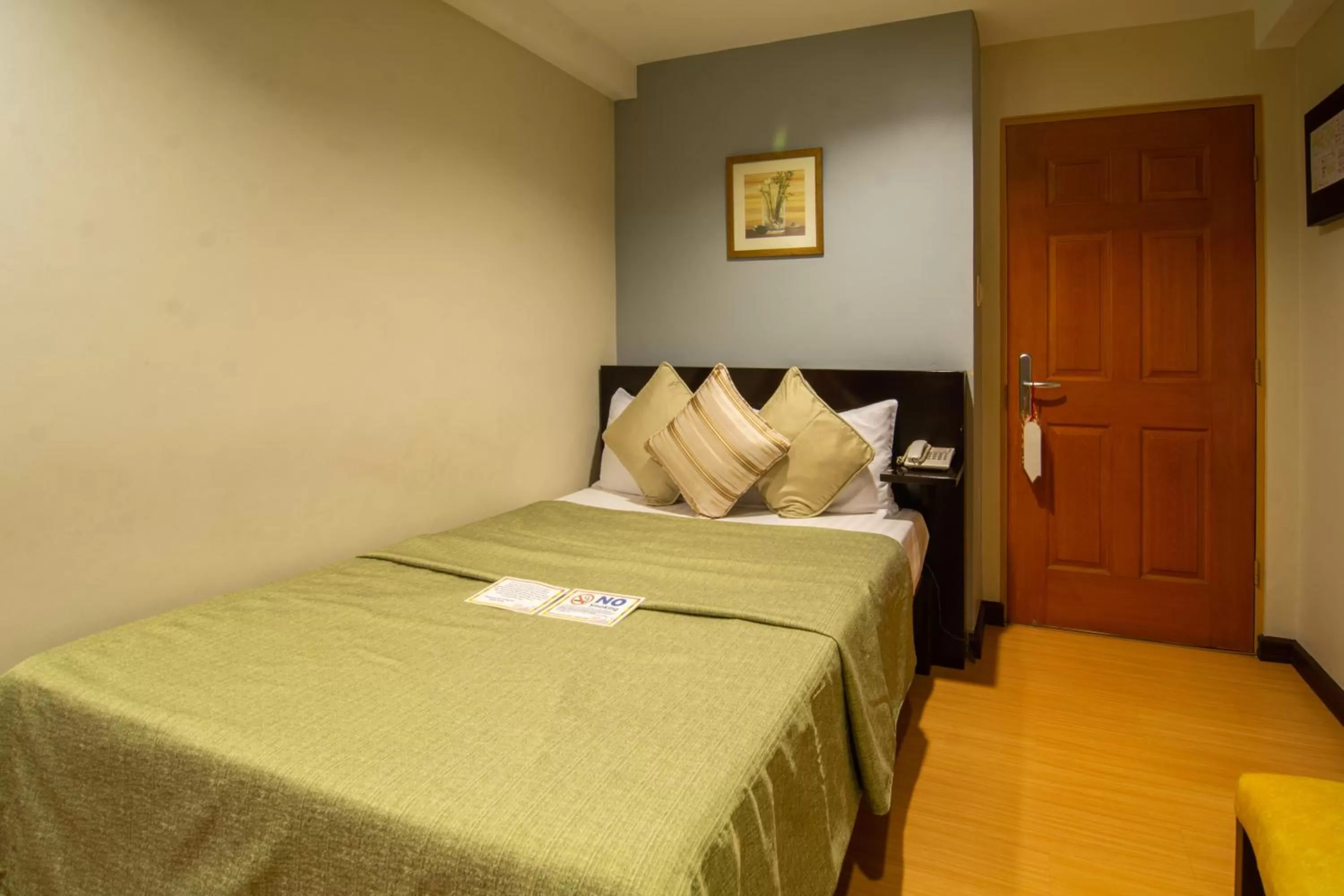 Bed in Festive Hotel Makati