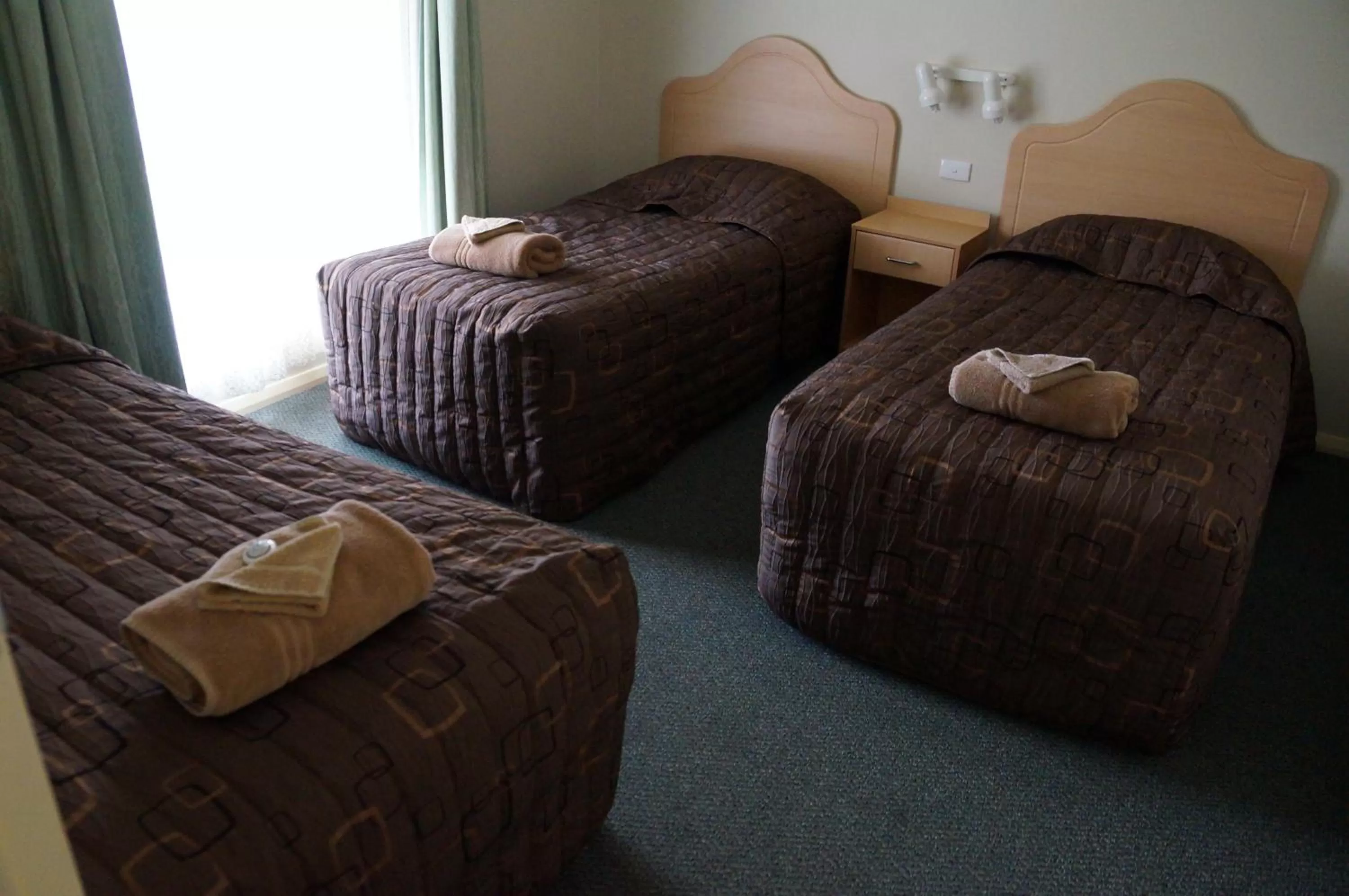 Bed in Green Gables Motel