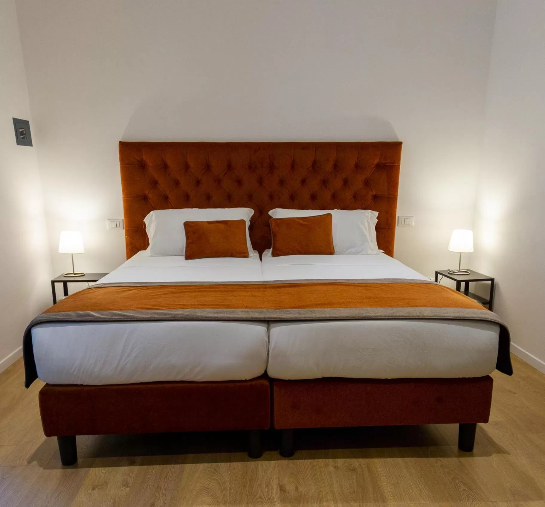 Bed in Michelangelo Vatican Rooms