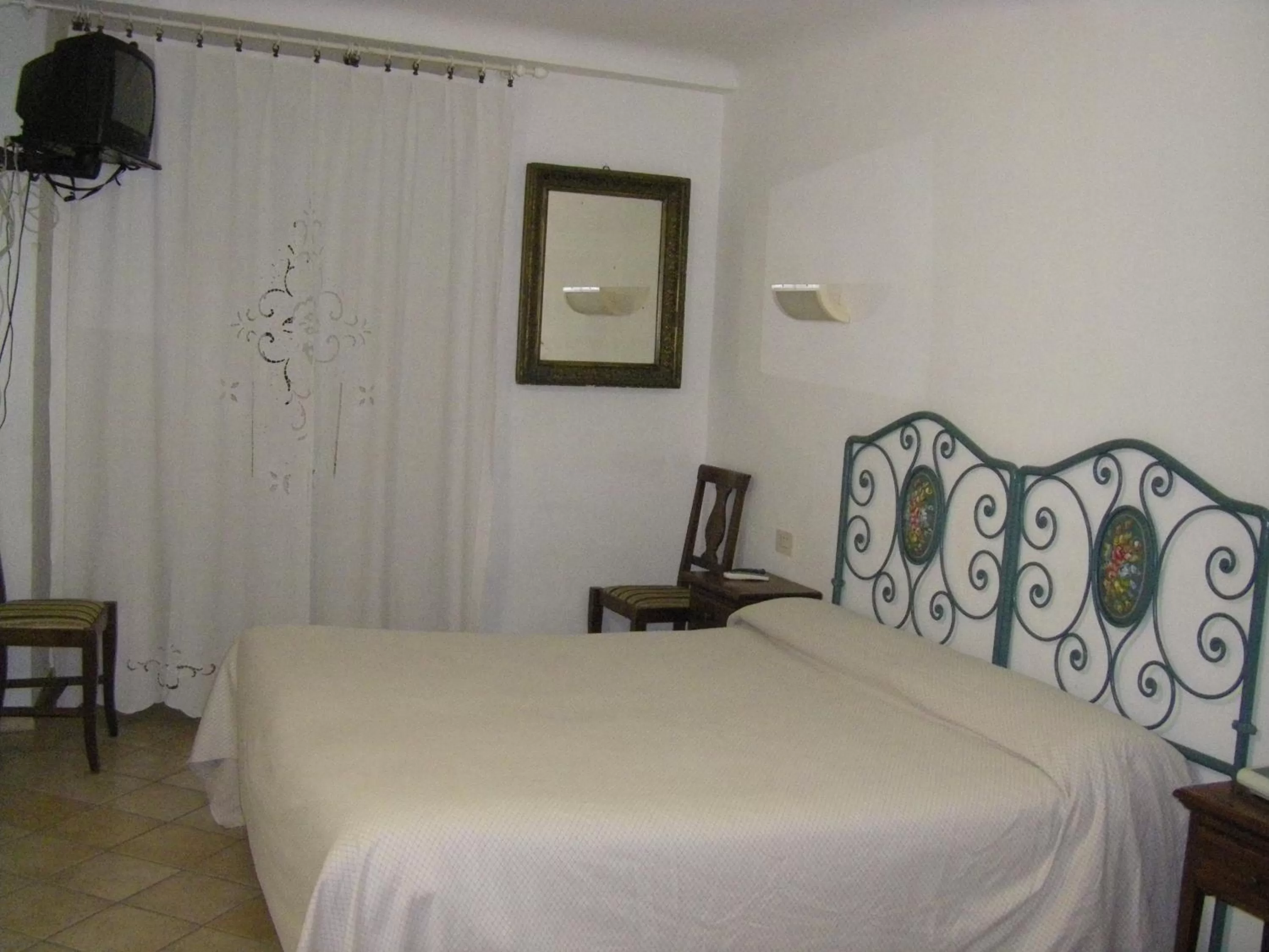 Bed in Albergo Cannon d'Oro