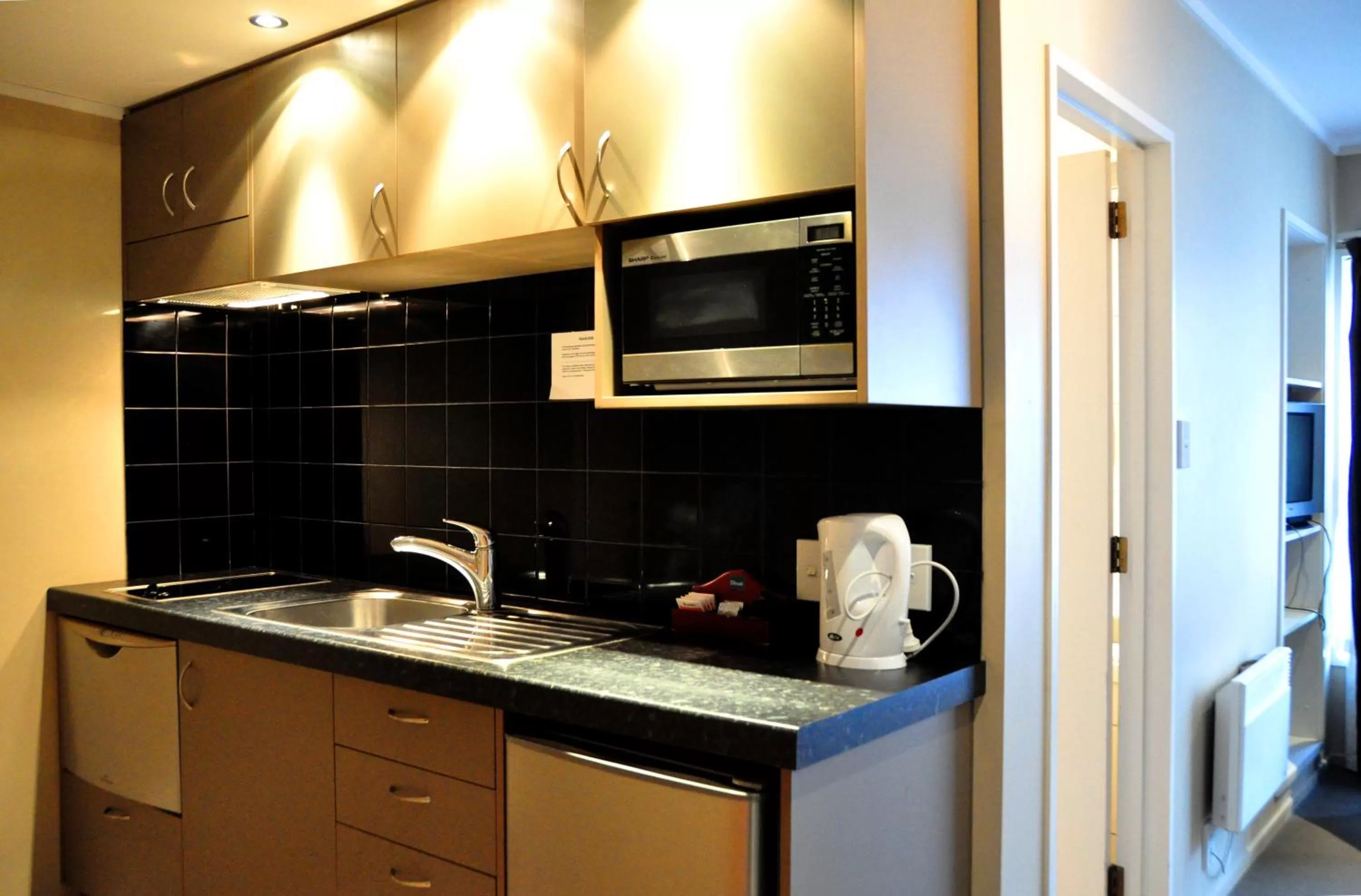Kitchen or kitchenette in St James Apartments