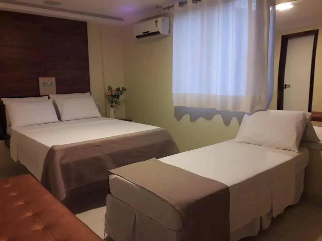 Bed in Hotel Sempre Executive