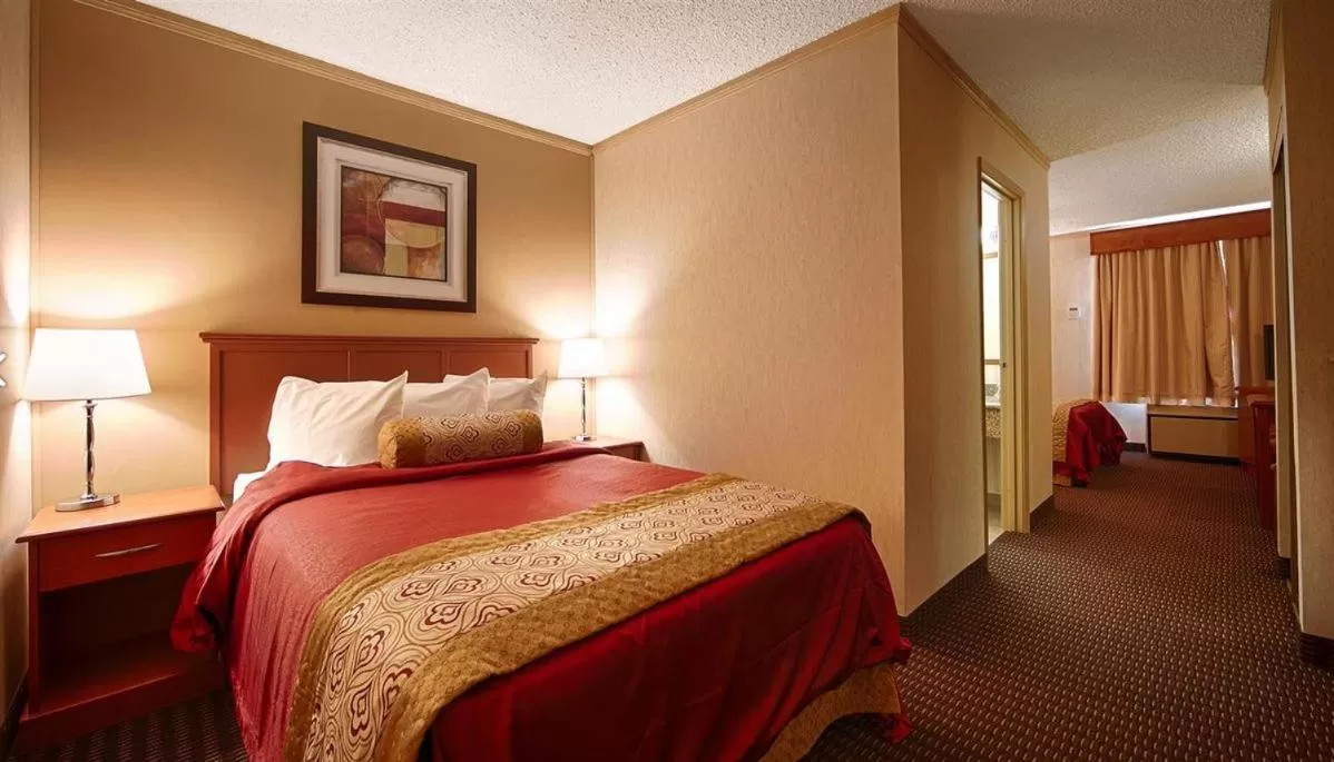 Photo of the whole room, Bed in All Stay Suites