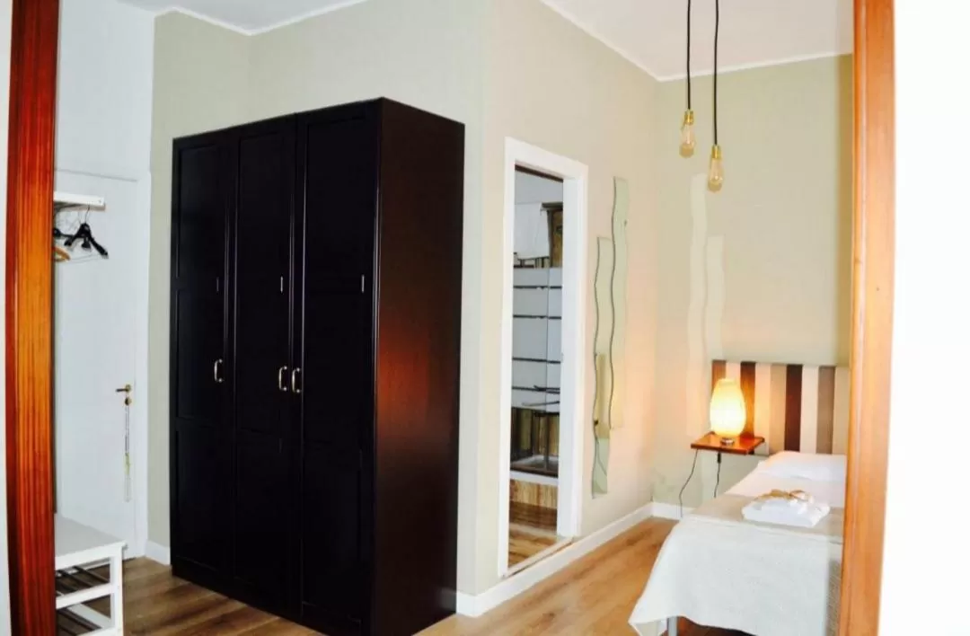 Bed in Battisti Rooms & Breakfast